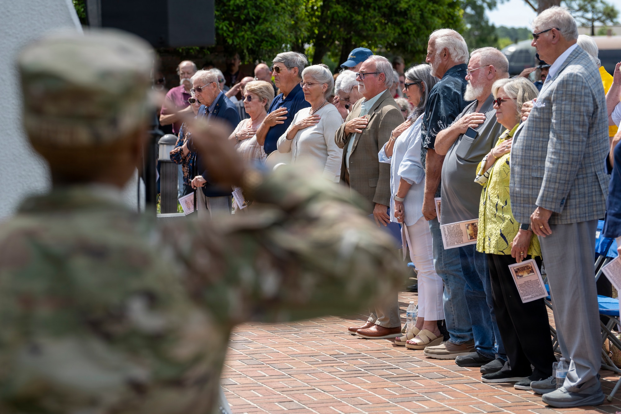 An Air Commando renders a salute during the playing of Taps during a ceremony honoring the 46th anniversary of Operation Eagle Claw at Hurlburt Field, Florida, April 24, 2026.