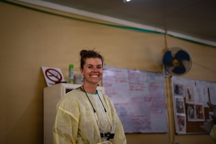 U.S. Air Force Reserve Maj. Kelsey Geiger, 434th Aerospace Medicine Squadron dentist, smiles in between serving patients during the Lesser Antilles Medical Assistance Team (LAMAT) 2026 mission at Medische Zending Primary Health Care Center Brownsweg, Suriname, April 13, 2026. Participating in her second medical mission overseas, Geiger applied her dental expertise in a resource-limited environment, helping provide relief to patients who may not have regular access to care. (U.S. Air Force photo by Staff Sgt. Madeline Herzog)