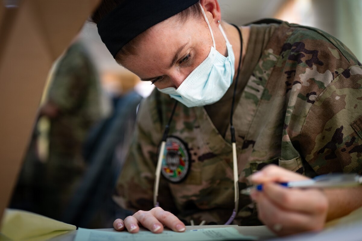 U.S. Air Force Reserve Maj. Kelsey Geiger, 434th Aerospace Medicine Squadron dentist, annotates patient information during the Lesser Antilles Medical Assistance Team (LAMAT) 2026 mission at Medische Zending Primary Health Care Center Brownsweg, Suriname, April 15, 2026. LAMAT 2026 demonstrates how partnership and solidarity go hand-in-hand—strengthening trust between the United States and regional partners through shared humanitarian goals. (U.S. Air Force photo by Staff Sgt. Madeline Herzog)