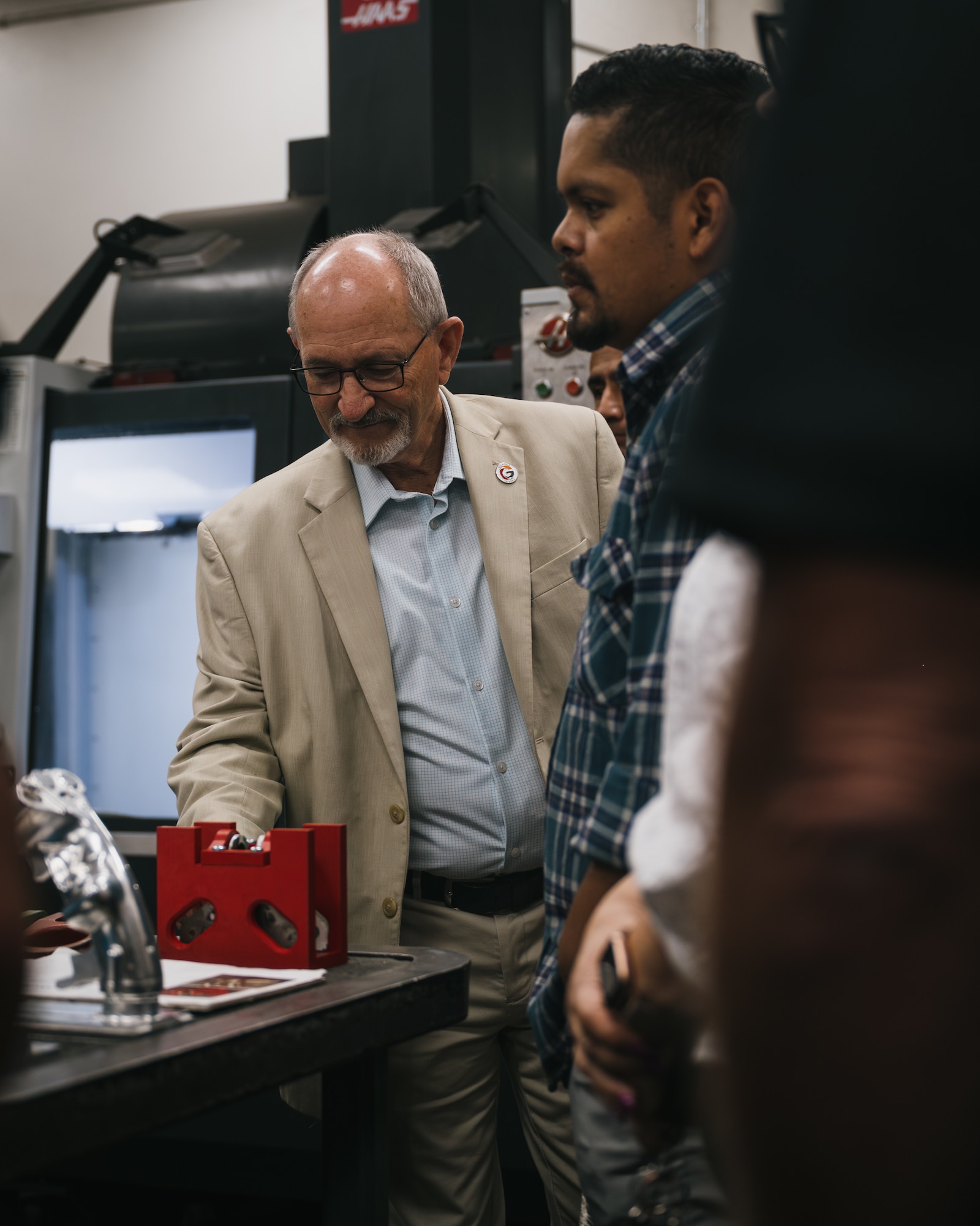 Ray Malnar, vice mayor of Glendale, Arizona, inspects equipment.