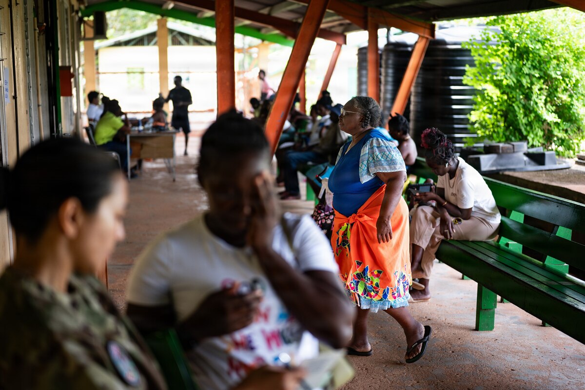 Surinamese patients wait to be seen by U.S. Air Force medical professionals during the Lesser Antilles Medical Assistance Team (LAMAT) 2026 mission at Medische Zending Primary Health Care Center Brownsweg, Suriname, April 13, 2026. Health resilience is directly tied to regional stability—strong medical systems help secure a safer, healthier Western Hemisphere. (U.S. Air Force photo by Staff Sgt. Madeline Herzog)