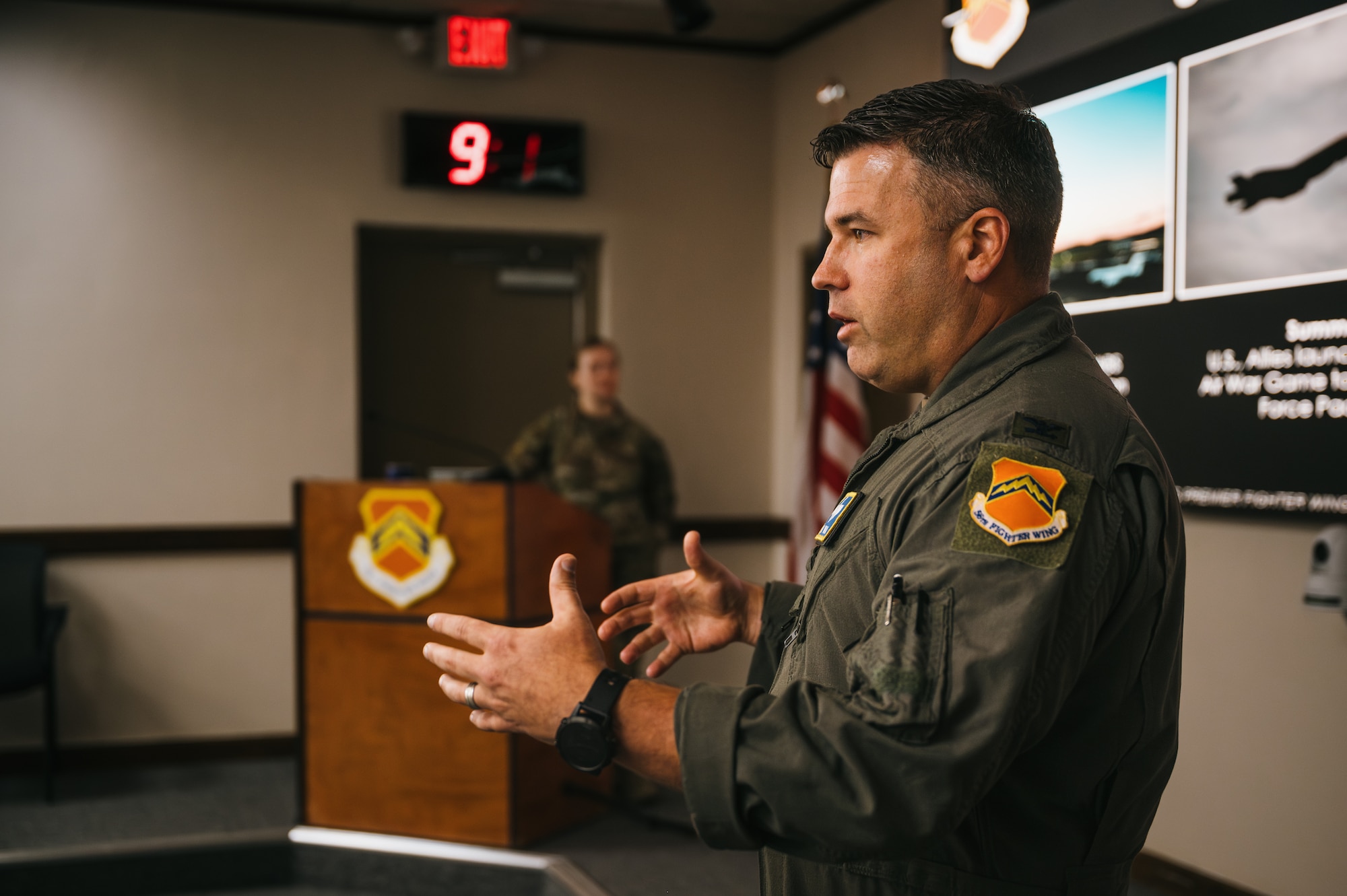 U.S. Air Force Col. John Ryan, 56th Fighter Wing deputy commander, speaks to West Valley elected officials during a tour.