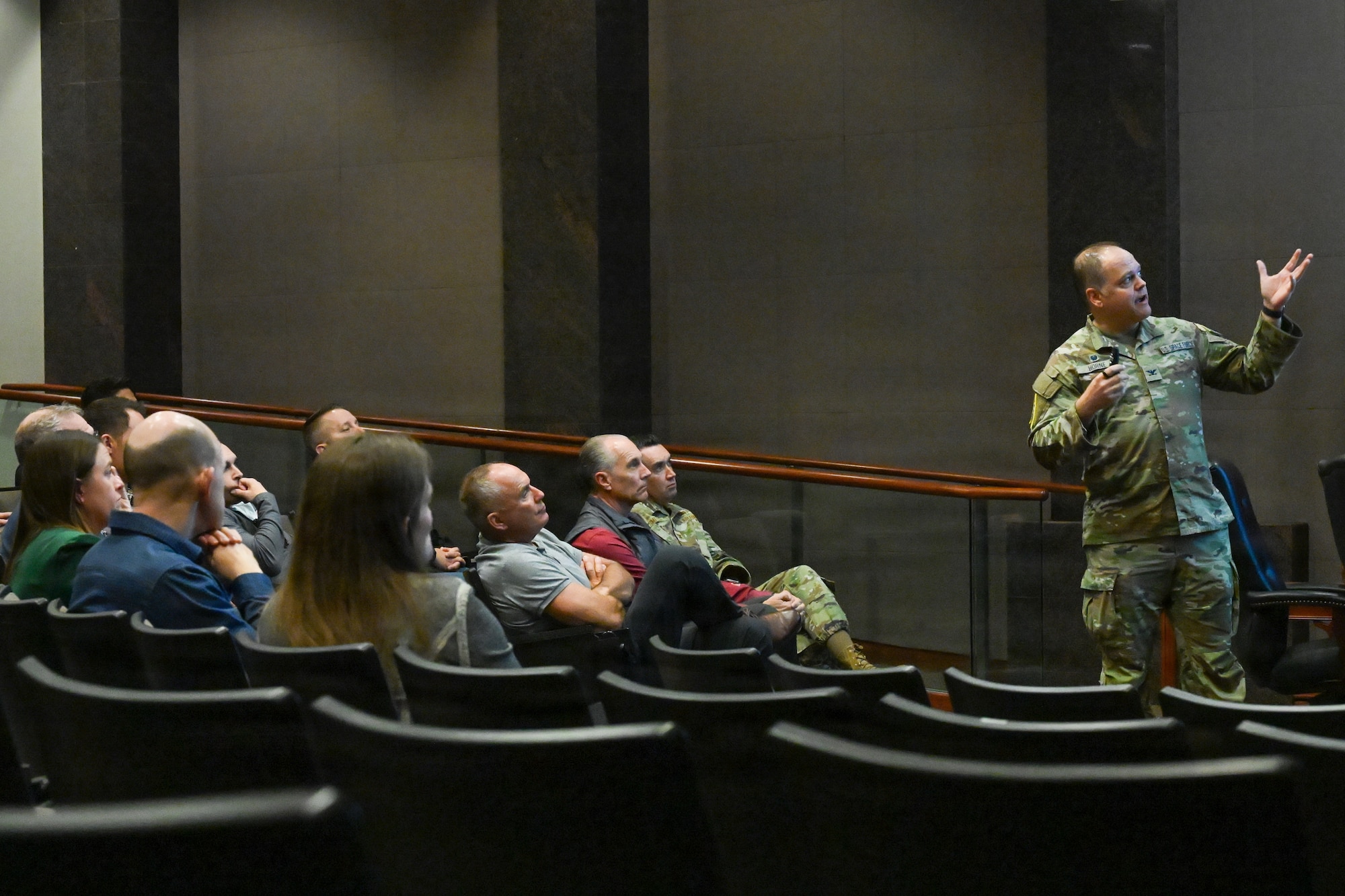 Horne speaks to a group of people sitting down