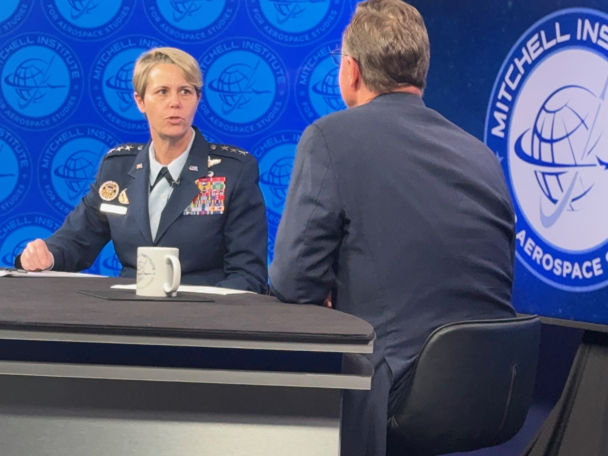 U.S. Air Force Lt. Gen. Rebecca Sonkiss, Air Mobility Command interim commander, speaks with JV Venable, Senior Resident Fellow at The Mitchell Institute for Aerospace Studies, on the critical role of mobility forces in global operations and outlined priorities for future modernization during an appearance on Aerospace Nation in Arlington, Virginia, April 20, 2026. AMC is focused on improving connectivity, viability and survivability of its fleet to ensure continued success as the maneuver for the Joint Force for contingencies worldwide. (U.S. Air Force photo by Lindsey Wilkinson)