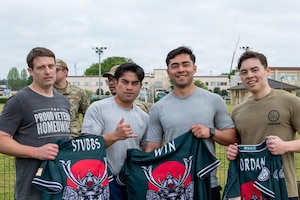 Airmen pose for a victory portrait.