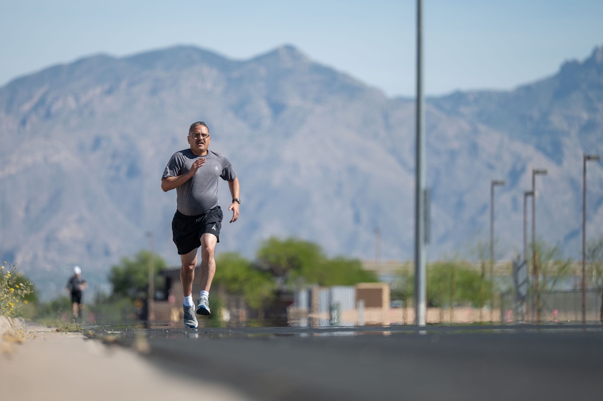 U.S. Space Force Lt. Col. Daniel Morales Jr., Space Forces Southern chief of plans, completes a 2-mile run during a Human Performance Assessment at Davis-Monthan Air Force Base, Arizona, April 23, 2026. Through efforts like the HPA, Space Forces Southern continues to build a culture focused on readiness, resilience, and sustained performance in support of joint operations across the region. (U.S. Air Force photo by Airman 1st Class Jaden Kidd)
