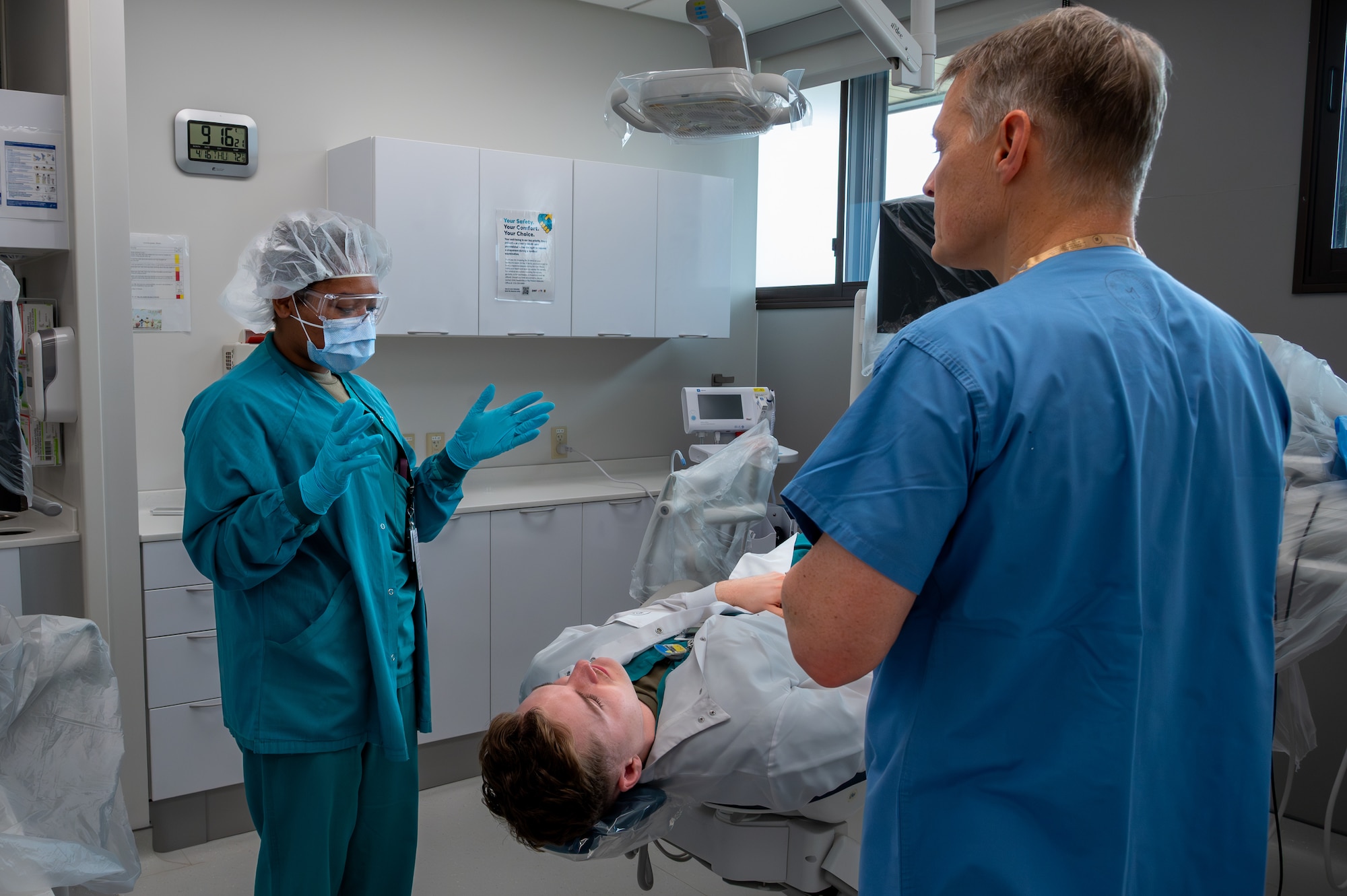 U.S. Air Force Airmen assigned to the 35th Medical Group, discuss patient procedures during tracer observation training at Misawa Air Base, Japan, April 16, 2026.