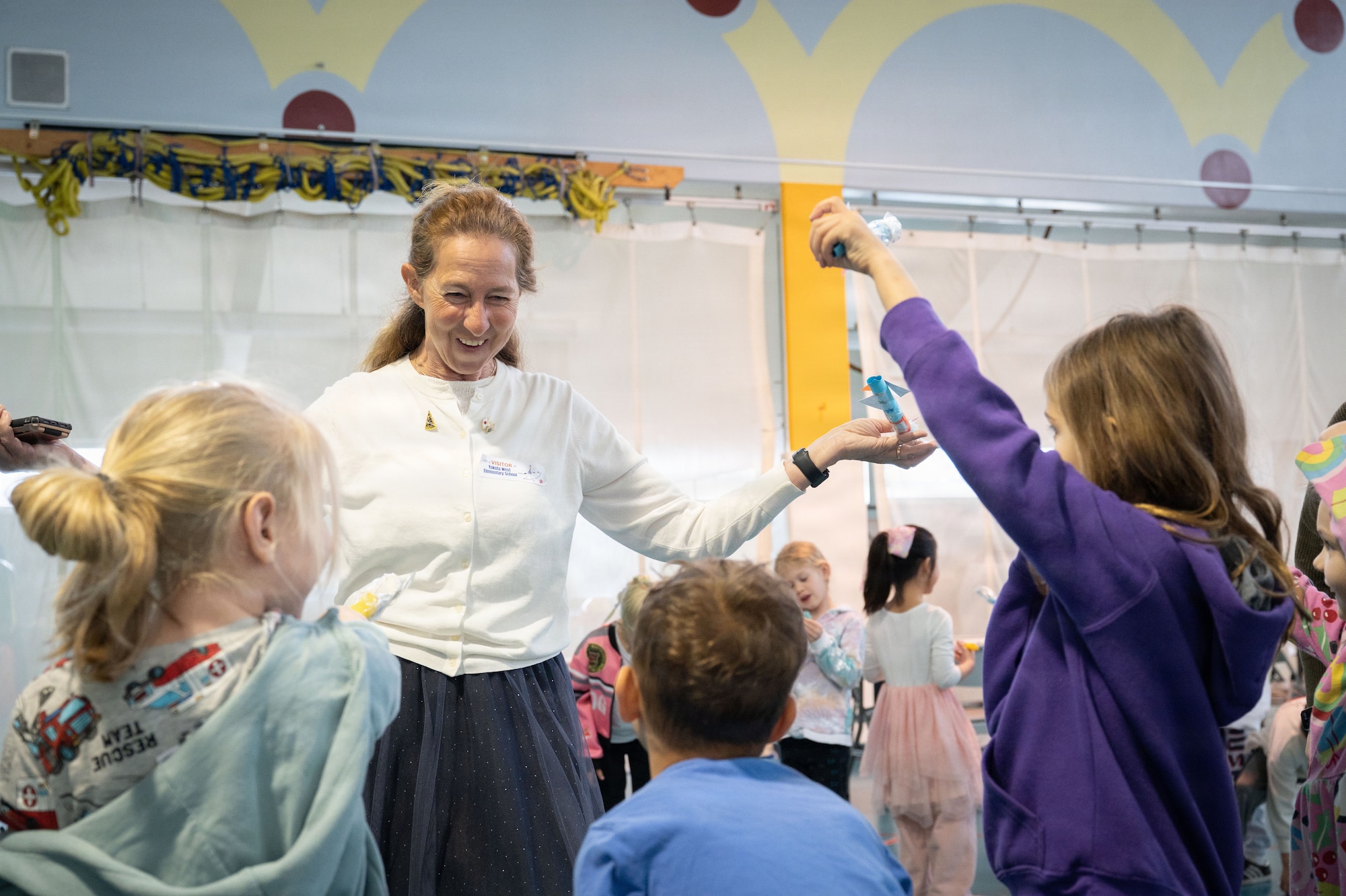 Guardians from U.S. Space Forces-Japan participated in SSC's STEM outreach program to foster early interest in science, technology, engineering, and math, promoting accessibility and curiosity in space-related systems.