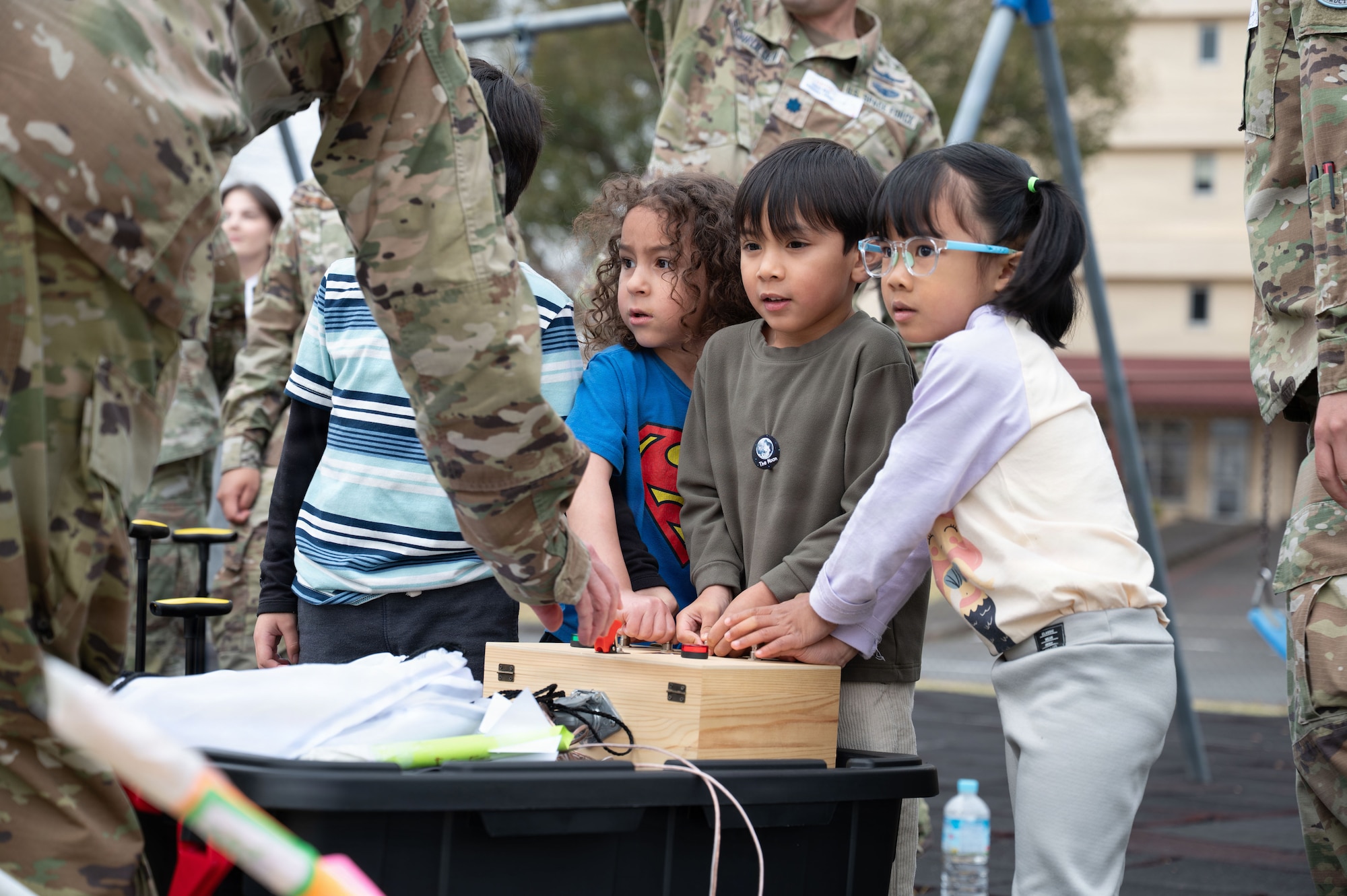 Guardians from U.S. Space Forces-Japan participated in SSC's STEM outreach program to foster early interest in science, technology, engineering, and math, promoting accessibility and curiosity in space-related systems.