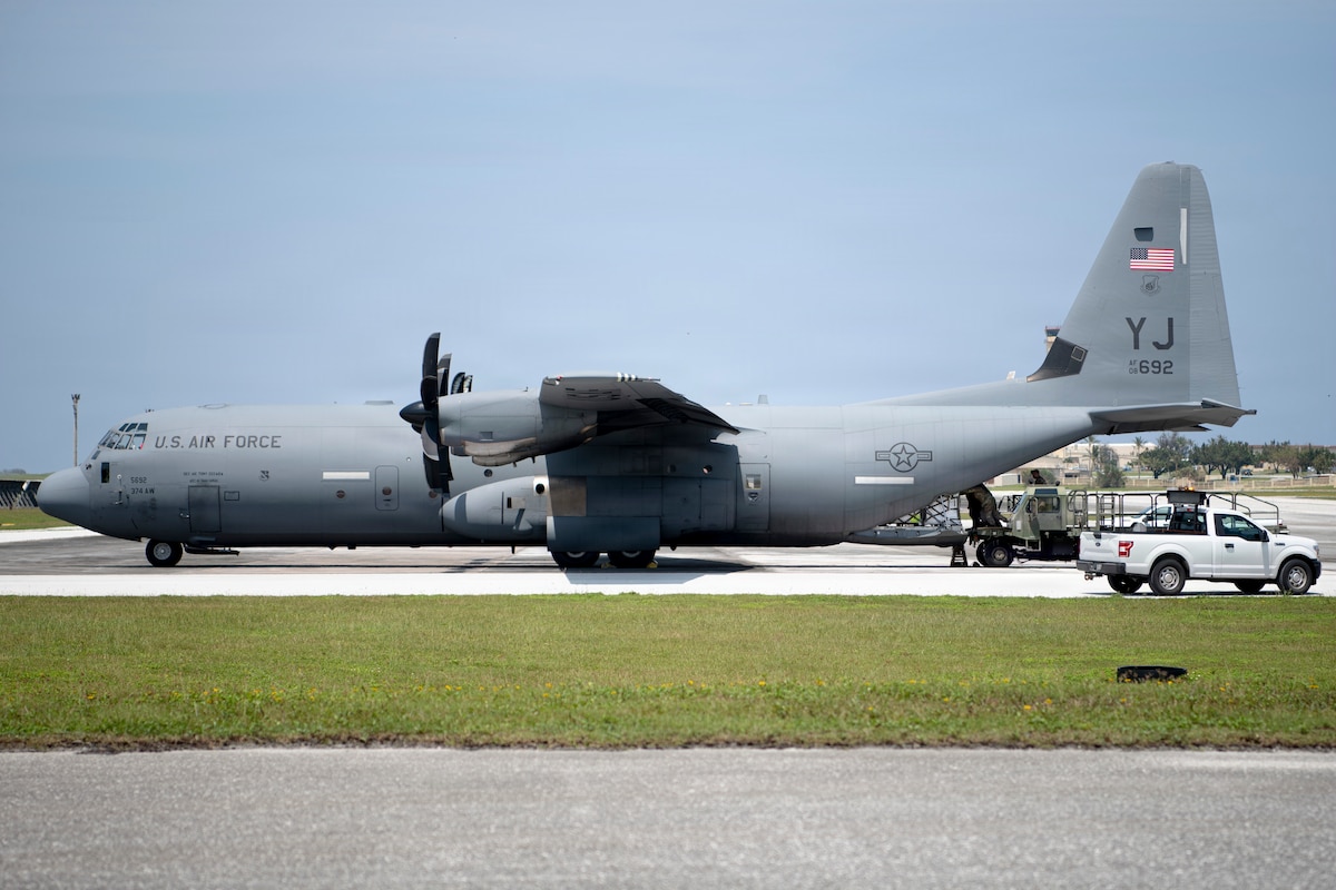 An Aircraft is loaded with cargo.