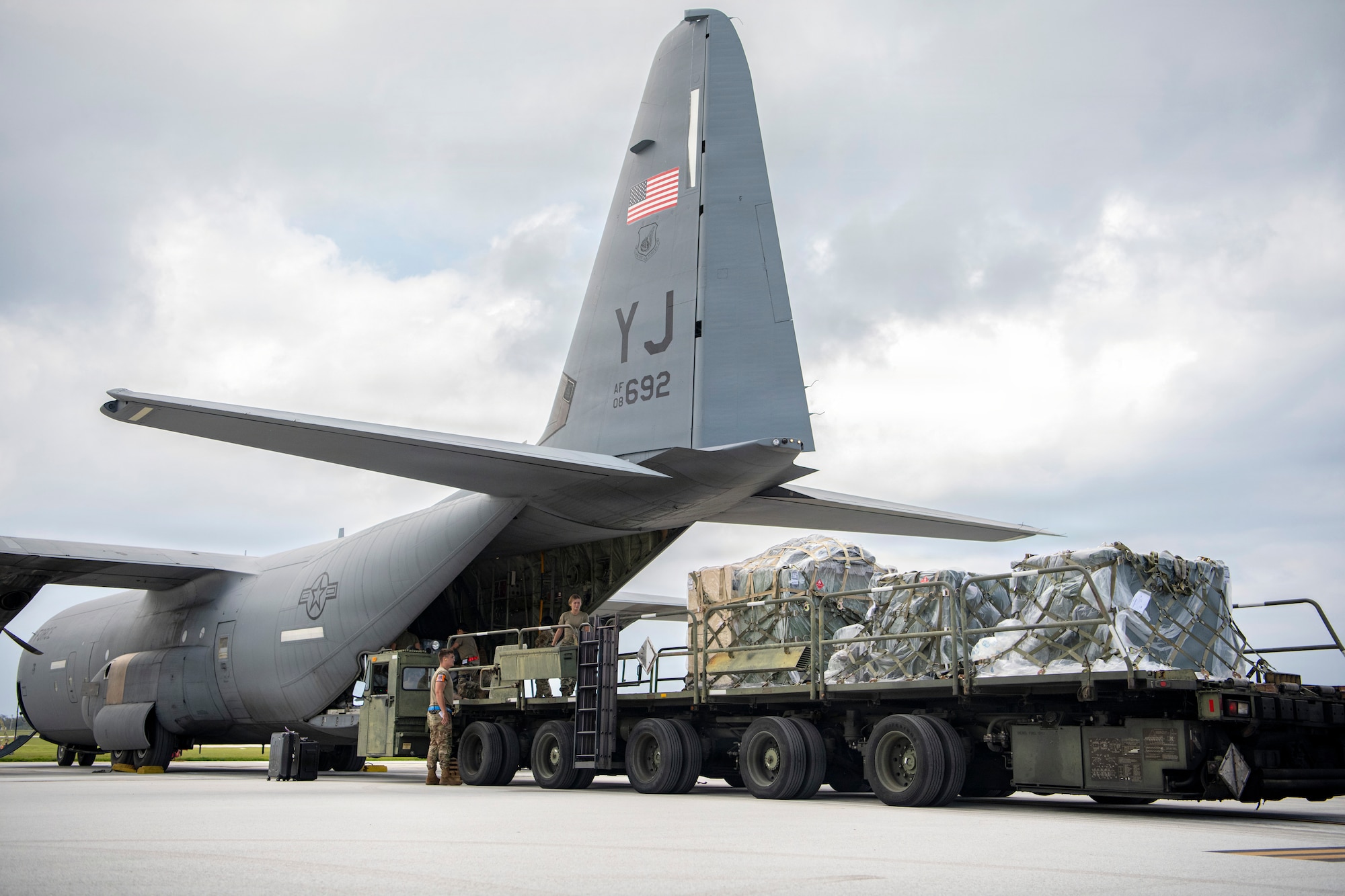 Cargo is loaded onto an aircraft.