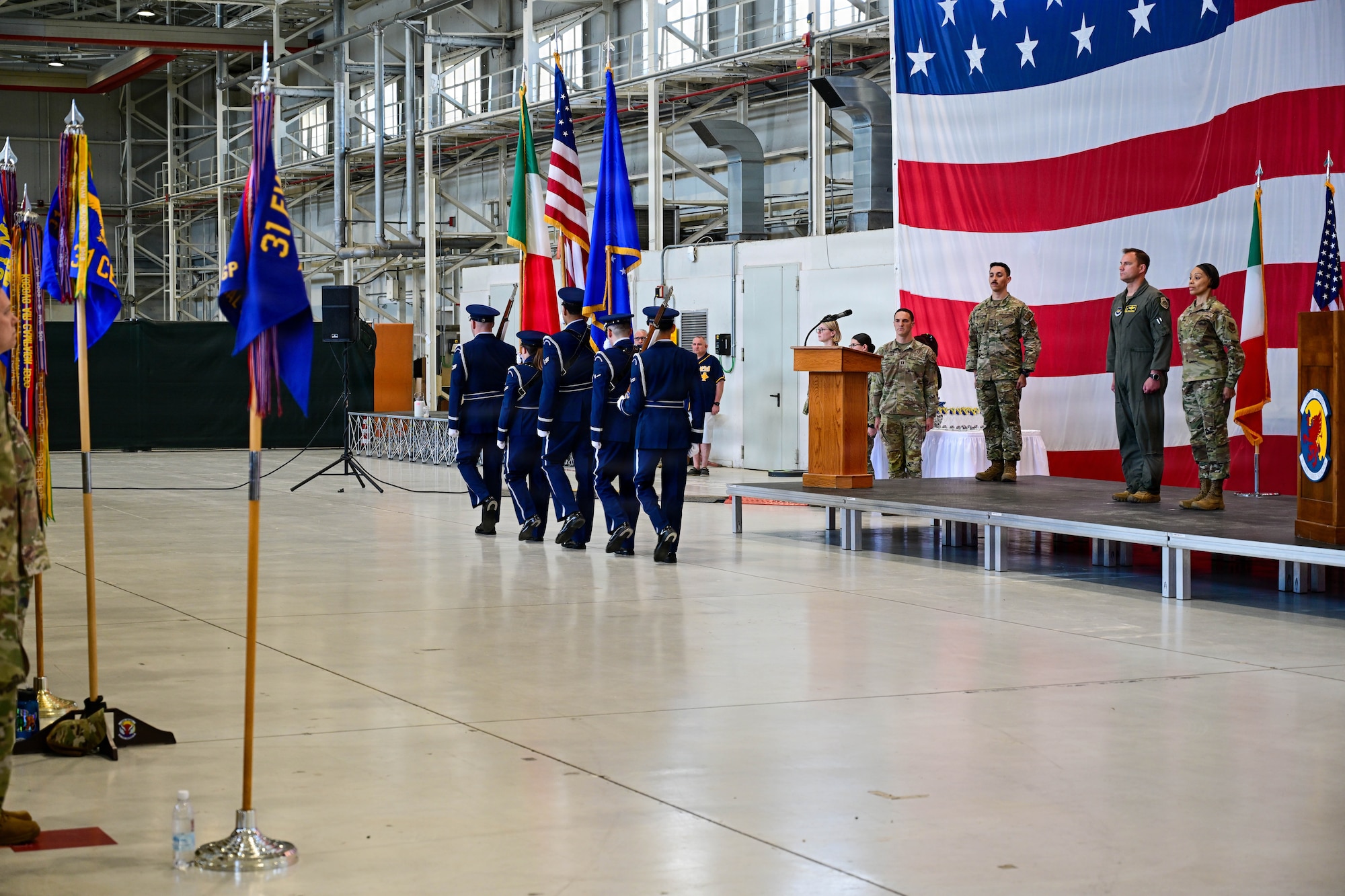 U.S. Air Force 31st Fighter Wing honor guardsmen present the colors during the 1st Quarter Wing Awards ceremony at Aviano Air Base, Italy, April 24, 2026.