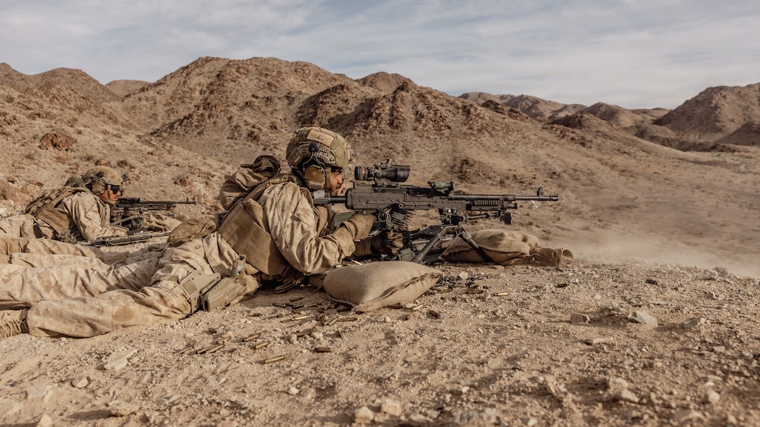 U.S. Marine Corps Cpl. Diego Rodriguez, a machine gunner with 1st Battalion, 2nd Marine Regiment, 2nd Marine Division, fires an M240B medium machine gun during a live fire platoon attack on range 410 Alpha as part of Service Level Training Exercise 2-26 on Marine Corps Air Ground Combat Center, Twentynine Palms, California, April 9, 2026. Designed to simulate the most realistic complex training environment available, SLTE 2-26 ensures units are combat-ready and capable of operating as an integrated Marine Air-Ground Task Force. (U.S. Marine Corps photo by Lance Cpl. Dominic Trujillo)