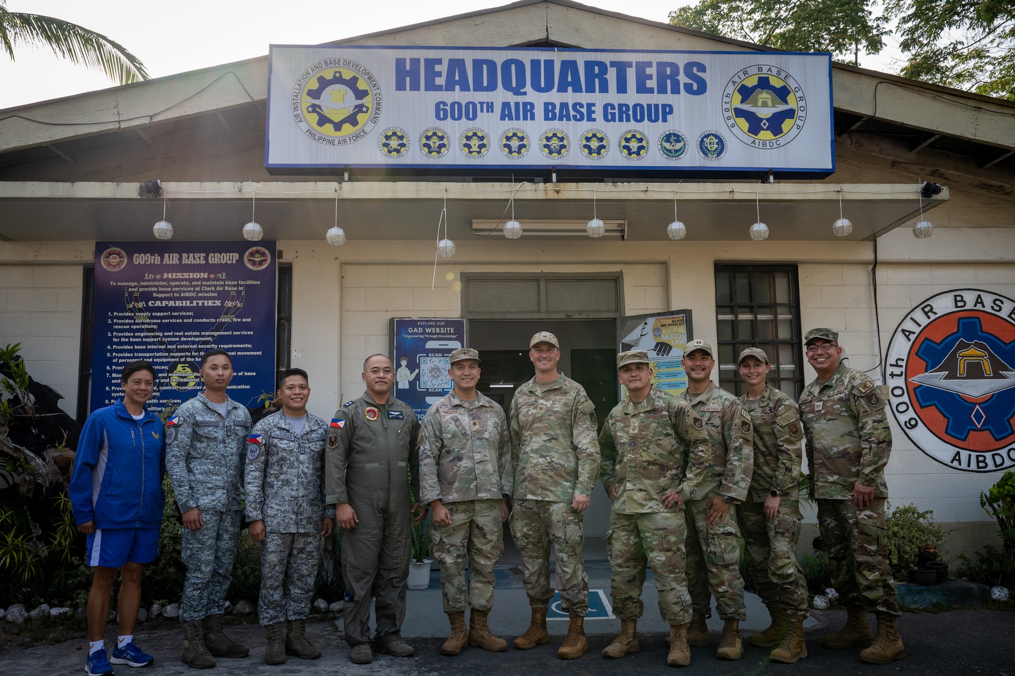 U.S. Air Force Airmen assigned to the 21st Air Expeditionary Wing and Philippines Air Force Airmen assigned to the 600th Air Base Group pose together for a group photo during Exercise Balikatan 2026 at Clark Air Base, Philippines, April 21, 2026. The 21st AEW invests in sustained operations alongside joint and allied partners. (U.S. Air Force photo by Airman 1st Class Adrien Tran)