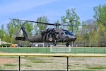 A UH-60L medevac helicopter assigned to the D.C. Army National Guard Aviation Battalion lands near the Uniformed Services University of the Health Sciences during a training exercise in Bethesda, Maryland, on April 10, 2026. The training provided medical school applicants and first-year medical students with instruction in medical evacuation procedures and tactical combat casualty care. Photo by Master Sgt. Arthur M. Wright.