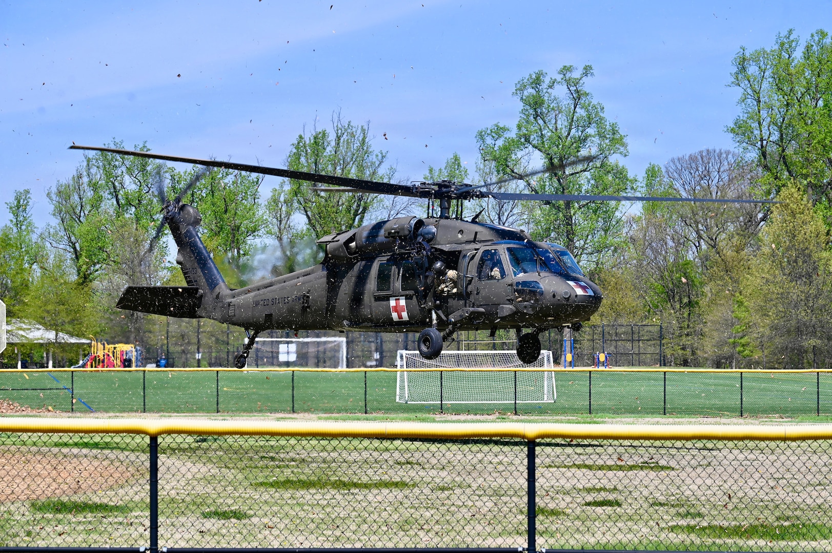 A UH-60L medevac helicopter assigned to the D.C. Army National Guard Aviation Battalion lands near the Uniformed Services University of the Health Sciences during a training exercise in Bethesda, Maryland, on April 10, 2026.
