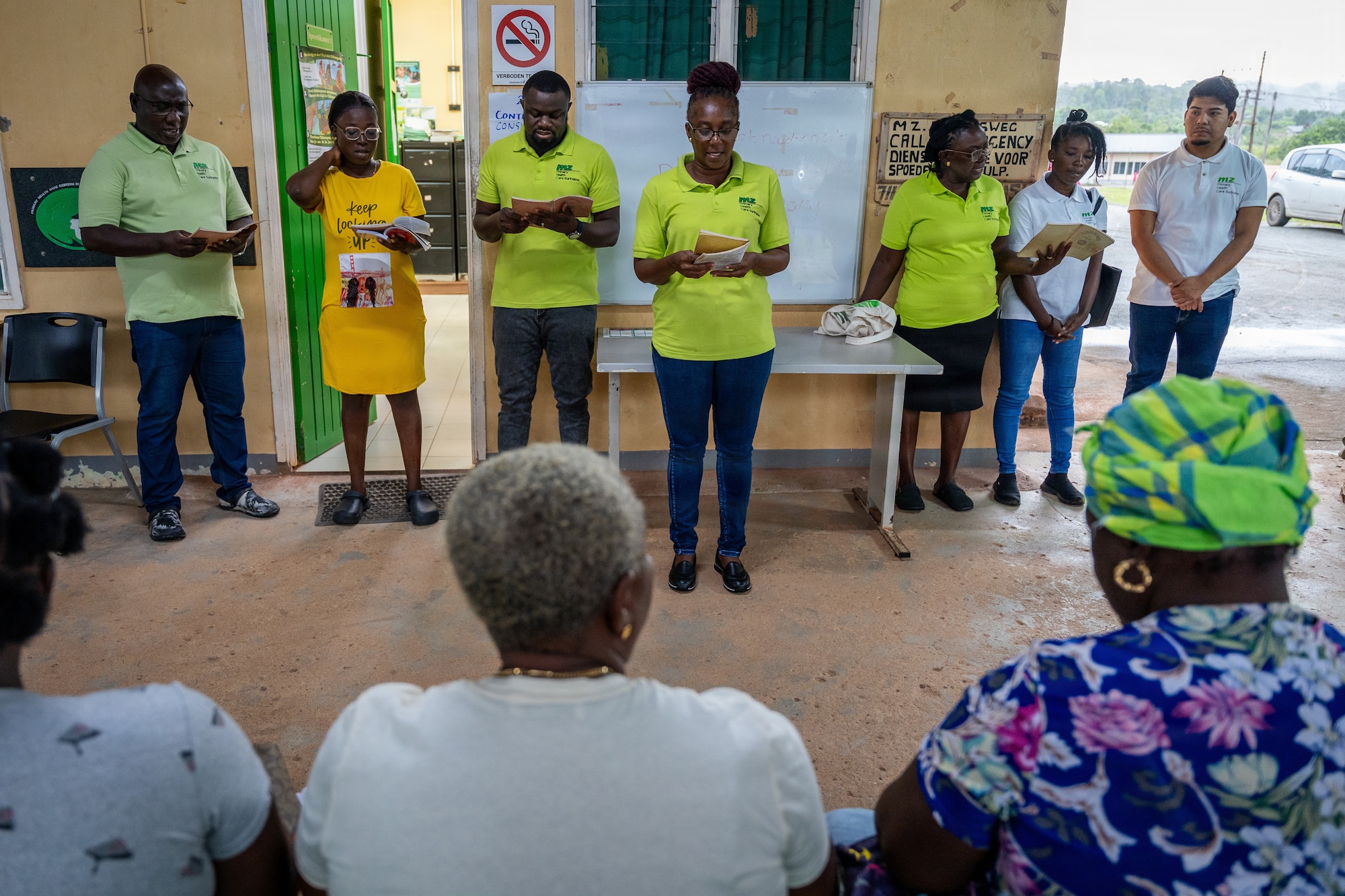 Surinamese healthcare professionals begin the workday with a morning ritual and songs at Medische Zending Primary Health Care Center in Brownsweg, Suriname, April 15, 2026. LAMAT 2026 strengthens collaboration between U.S. Air Force medical teams and Ministry of Health providers across medical facilities in Suriname. (U.S. Air Force photo by Staff Sgt. Joshua Hastings)