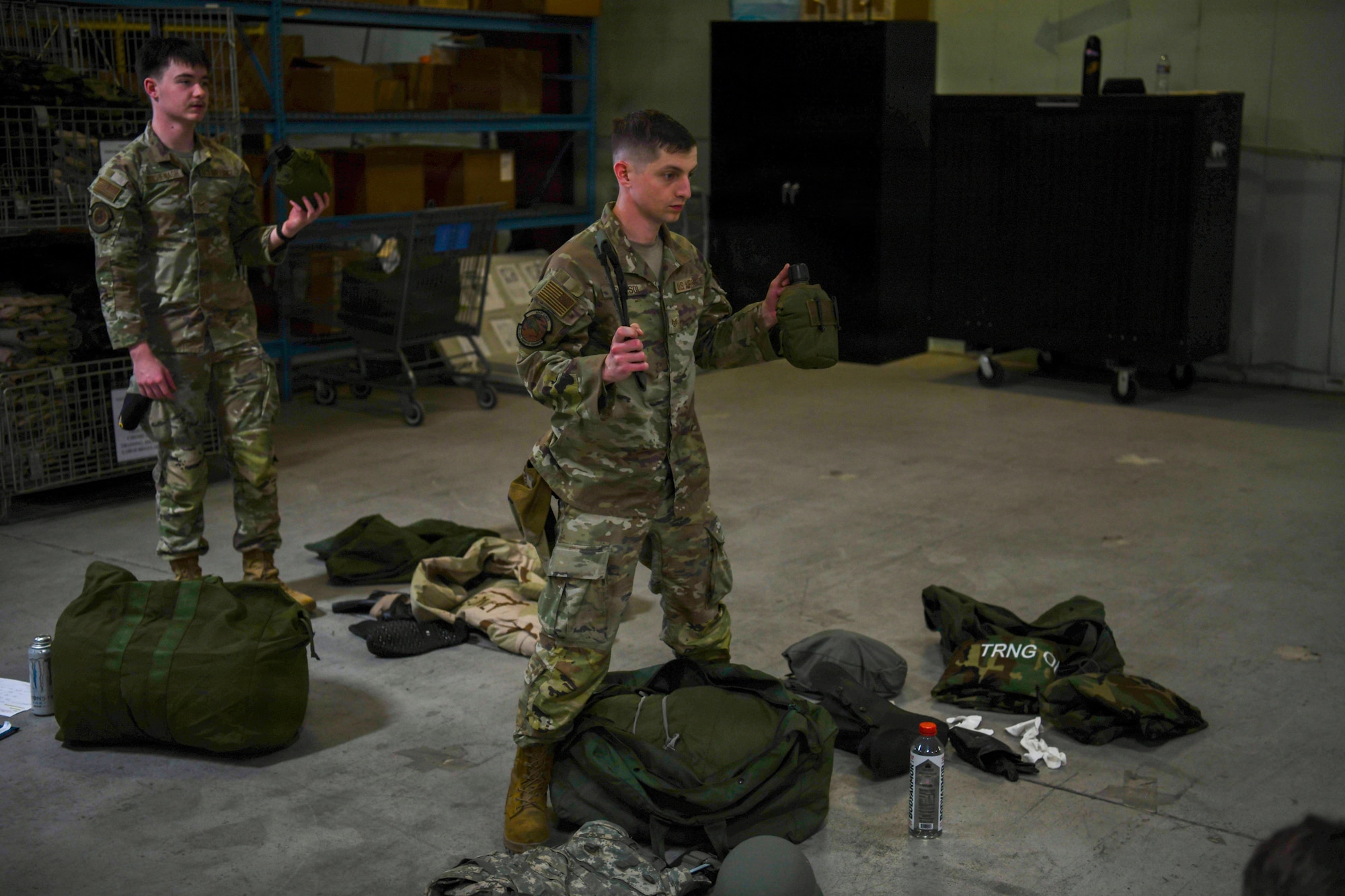An airman inspects equipment.