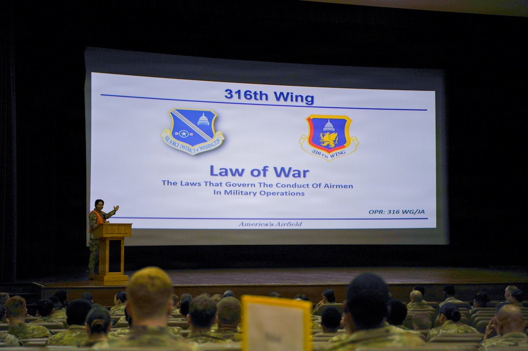 Airman gives a lecture titled "Law of War".