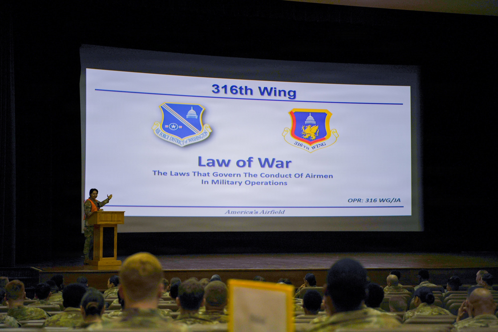 Airman gives a lecture titled "Law of War".