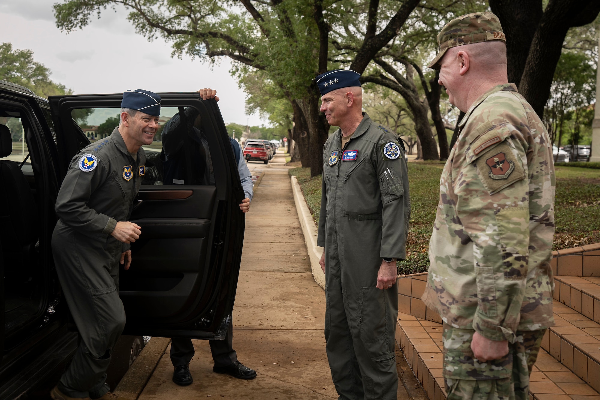 U.S. Air Force Chief of Staff Gen. Ken Wilsbach is greeted by Lt. Gen. Clark Quinn, commander of Air Education and Training Command, and Chief Master Sgt. Chad Bickley, AETC command chief at Joint Base San Antonio-Randolph, Texas, April 23, 2026. Wilsbach and his wife, Mrs. Cindy Wilsbach, visited several organizations within JBSA for a comprehensive immersion into The First Command.