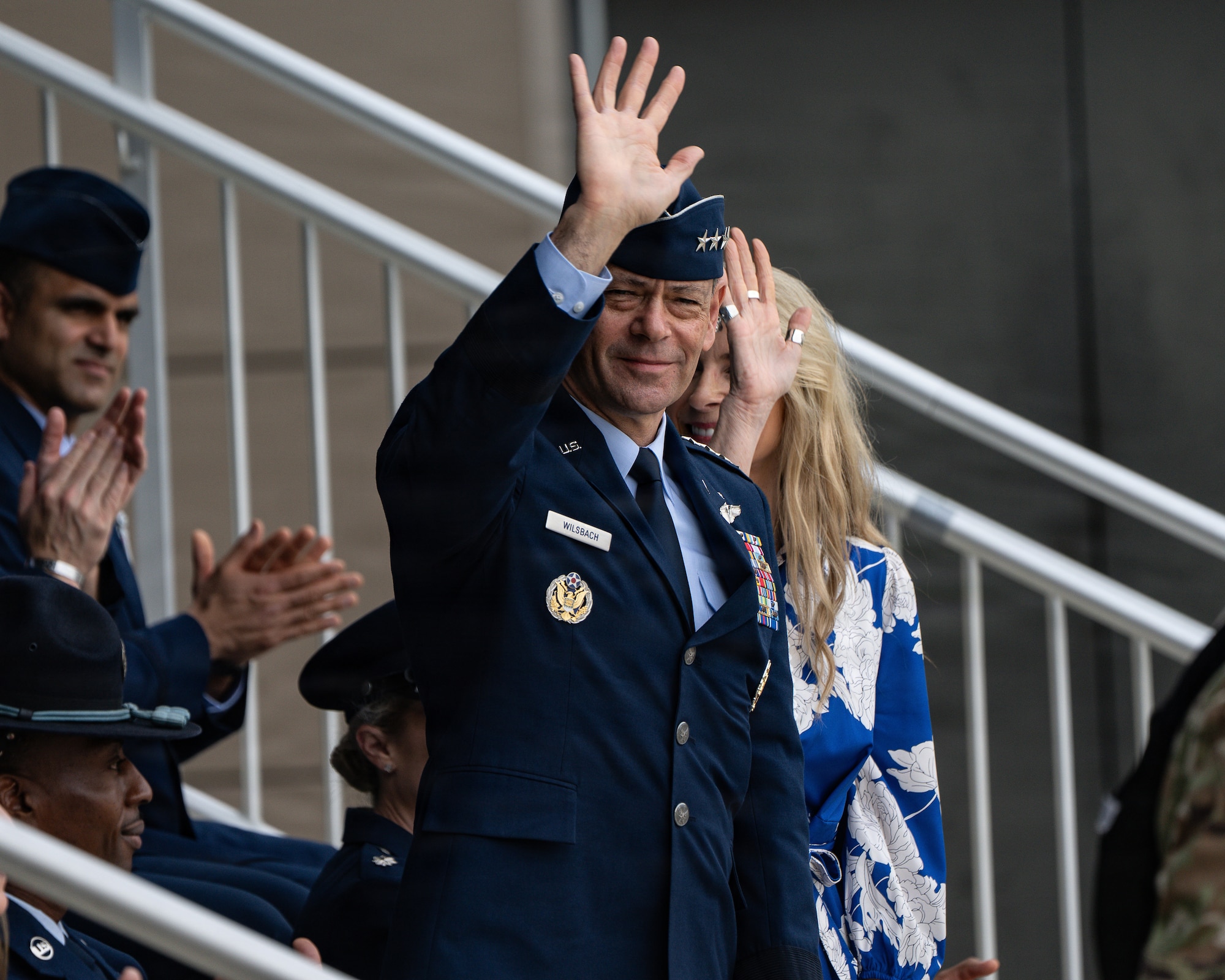 U.S. Air Force Chief of Staff Gen. Ken Wilsbach waves to attendees during a Basic Military Training graduation ceremony at Joint Base San Antonio-Lackland, Texas, April 23, 2026. Wilsbach presided over the ceremony after engaging with military training instructors and the service’s newest Airmen throughout a multi-day visit.