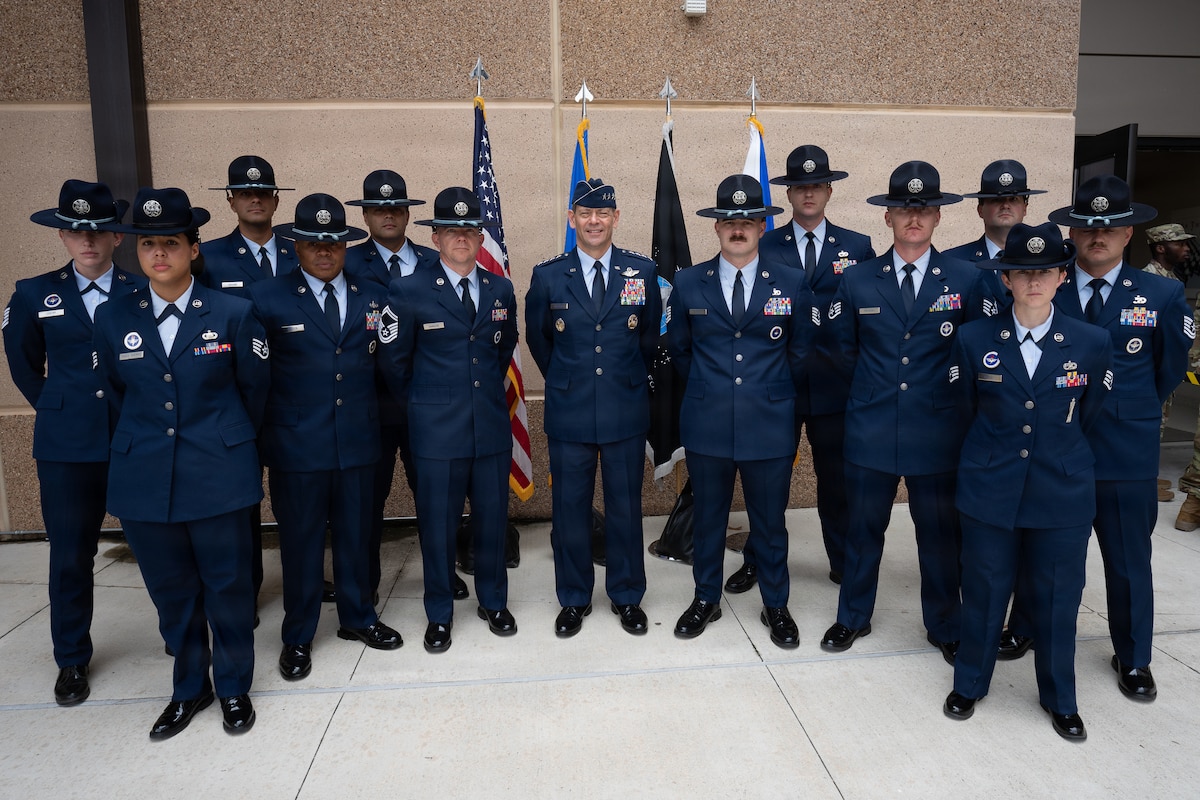 U.S. Air Force Chief of Staff Gen. Ken Wilsbach, center, poses for a photo with military training instructors following Basic Military Training graduation at Joint Base San Antonio-Lackland, Texas, April 23, 2026. More than 787 Airmen graduated, completing 7 1/2 weeks of training.