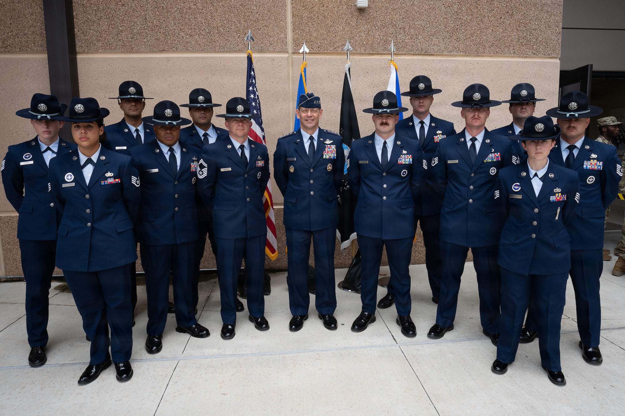 U.S. Air Force Chief of Staff Gen. Ken Wilsbach, center, poses for a photo with military training instructors following Basic Military Training graduation at Joint Base San Antonio-Lackland, Texas, April 23, 2026. More than 787 Airmen graduated, completing 7 1/2 weeks of training.