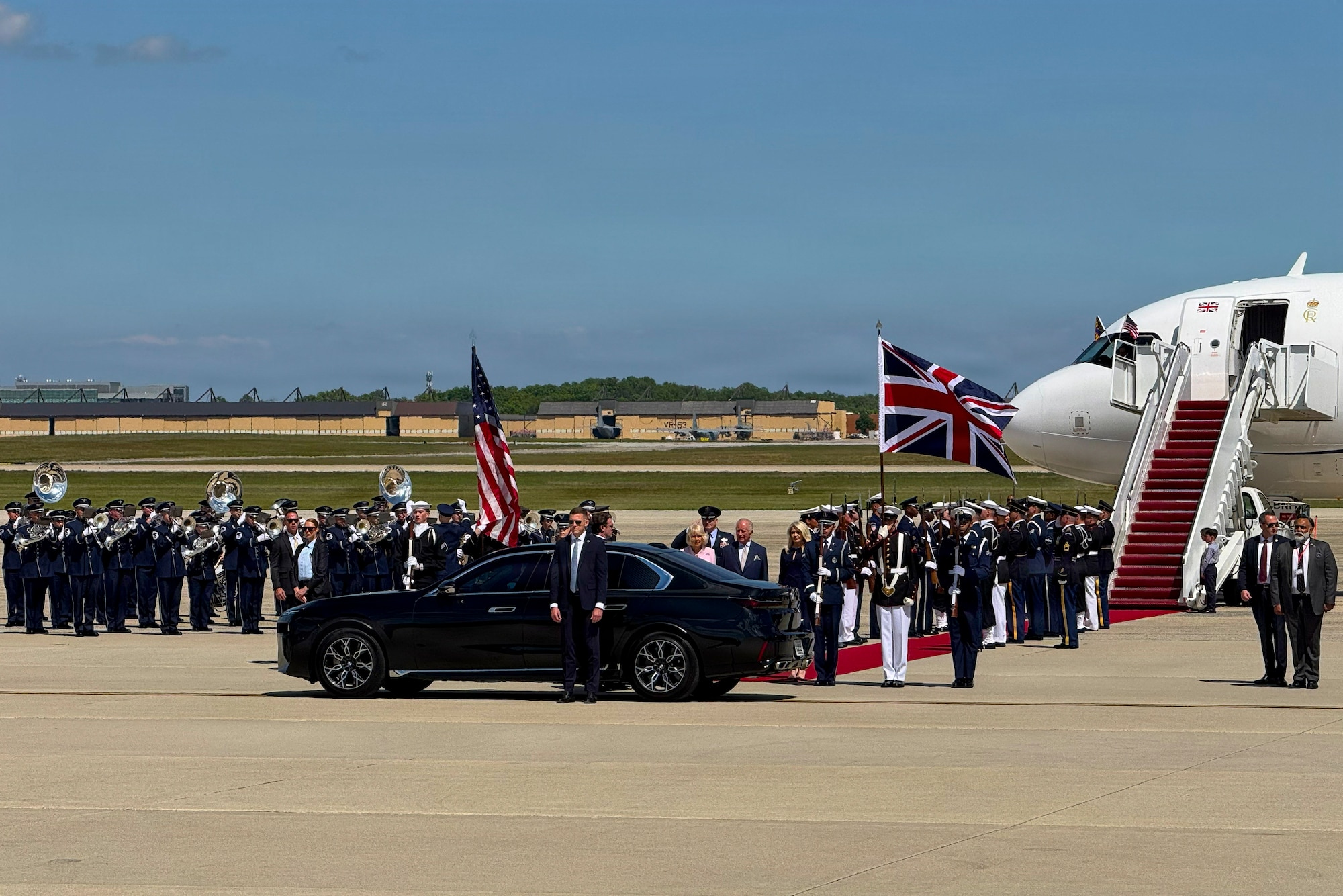 The U.S. Air Force Band and an armed forces full honor cordon perform during an arrival ceremony for their Majesties of the United Kingdom of Great Britain and Northern Ireland.