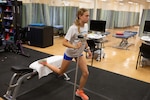 Sadie Kreuger, a student-athlete from Moanalua High School, performs rehabilitation exercises at Tripler Army Medical Center (TAMC), April 17. With support from TAMC’s physical therapy team, Kreuger recovered from injury, won the Hawaii State Cross-Country title, earned recognition as the Hawaii Gatorade Player of the Year for cross-country, and qualified to represent Team West at the Brooks Cross Country Nationals. (Defense Health Agency photos by Hugh Fleming)