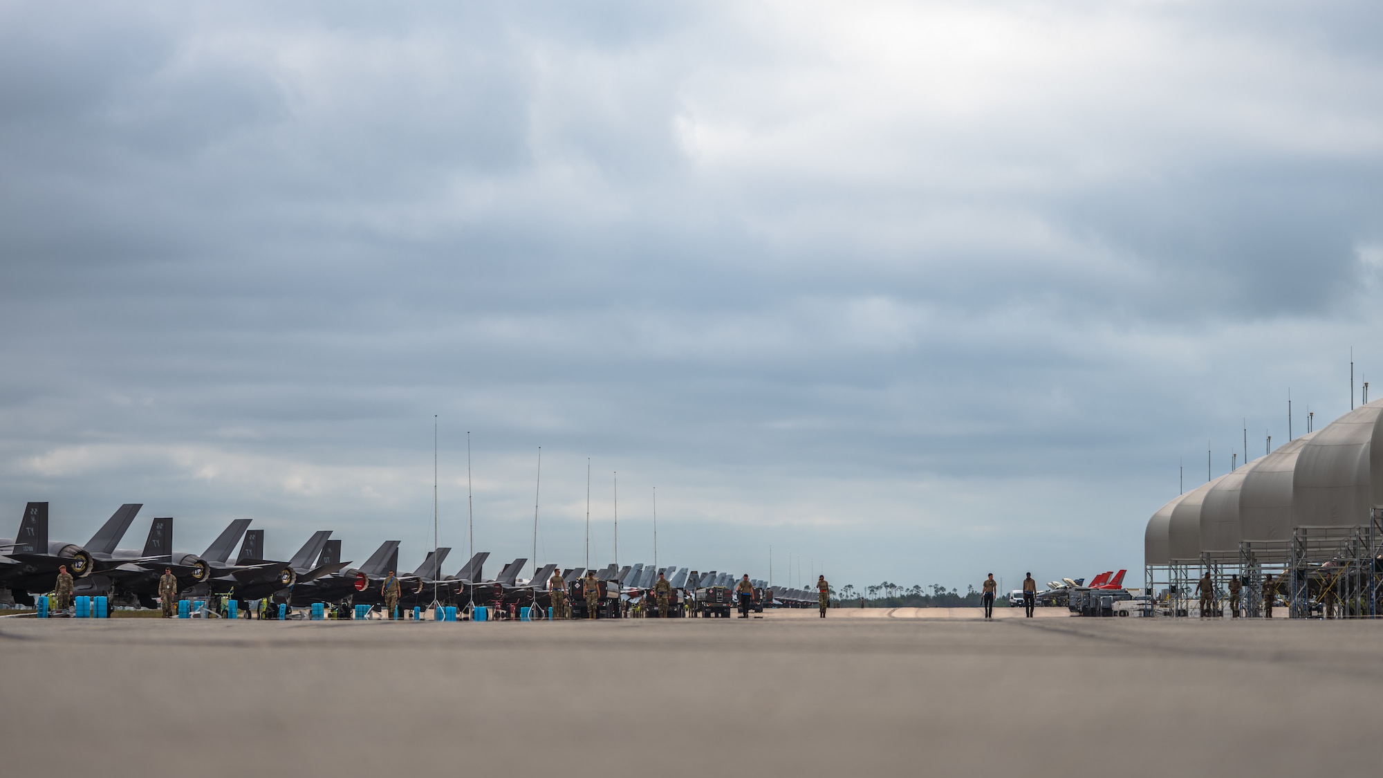 U.S. Airmen assigned to the 95th Fighter Generation Squadron step to aircraft at Tyndall Air Force Base, Florida, during Checkered Flag 26-2, April 28, 2026.