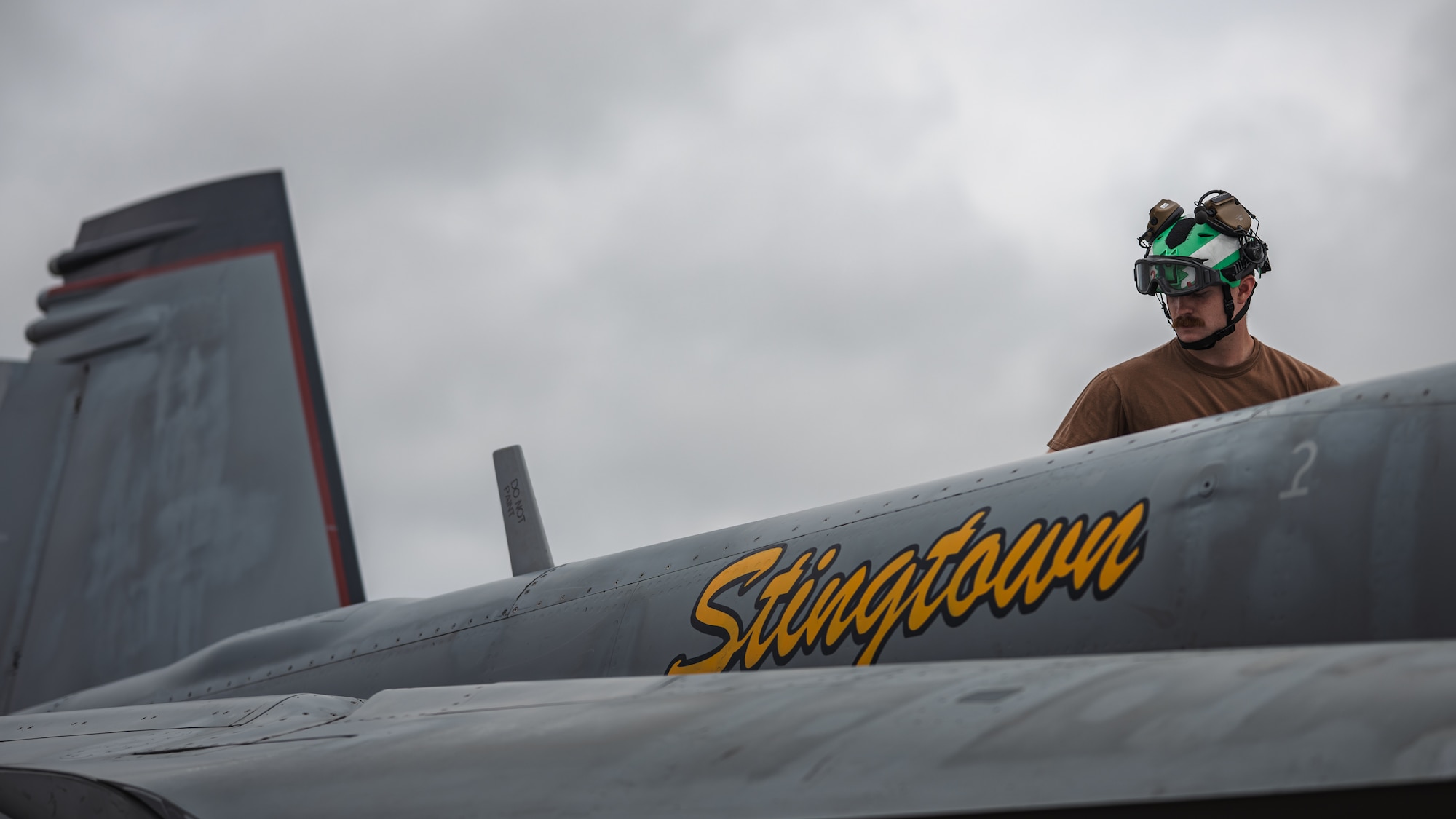 U.S. Navy Aviation Machinist Mate Easton Rodgers, assigned to Strike Fighter Squadron (VFA) 113, Naval Air Station Lemoore, California, performs pre-flight maintenance on an F/A-18F Super Hornet assigned to VFA-113 at Tyndall Air Force Base, Florida, during Checkered Flag 26-2, April 28, 2026.