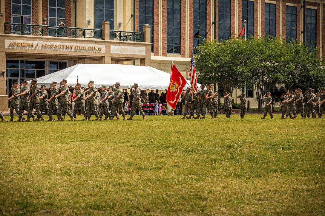 U.S. Marines with Marine Corps Support Facility New Orleans march in a pass and review during a relief and appointment ceremony held at the Marine Corps Support Facility New Orleans, Apr. 24, 2026. During the ceremony, Sgt. Maj. Kabiru Labaran relinquished his duties to Sgt. Maj. Roberto Sim, Headquarters Battalion, Marine Forces Reserve, Marine Forces South. (U.S. Marine Corps photo by Lance Cpl. Edward Spears)