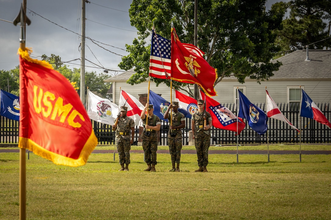 U.S. Marines with Marine Forces Reserve and Marine Forces South color guard hold the colors during a relief and appointment ceremony at Marine Corps Support Facility New Orleans, Apr. 24, 2026. Sgt. Maj. Kabiru Labaran relinquished his duties to Sgt. Maj. Roberto Sim, incoming sergeant major, Headquarters Battalion, Marine Forces Reserve, Marine Forces South. (U.S. Marine Corps photo by Lance Cpl. Edward Spears)