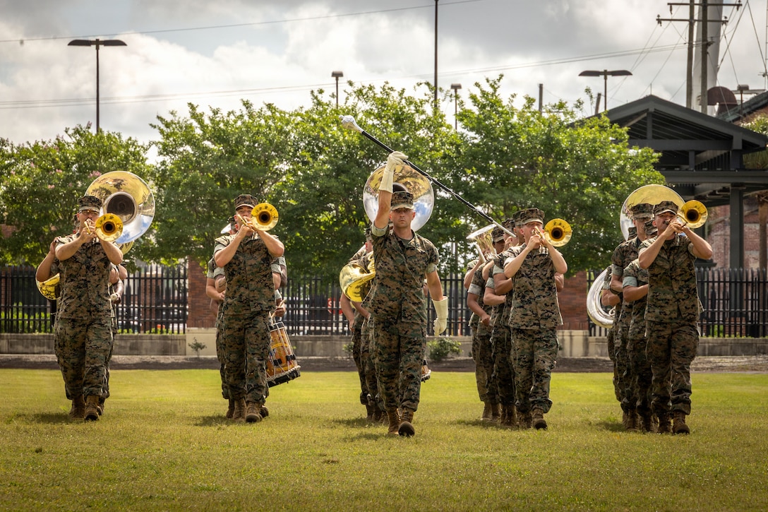 U.S. Marines with Marine Forces Reserve Band perform during a relief and appointment ceremony at Marine Corps Support Facility New Orleans, Apr. 24, 2026. Sgt. Maj. Kabiru Labaran, relinquished his duties to Sgt. Maj. Roberto Sim, Headquarters Battalion, Marine Forces Reserve, Marine Forces South. (U.S. Marine Corps photo by Lance Cpl. Edward Spears)