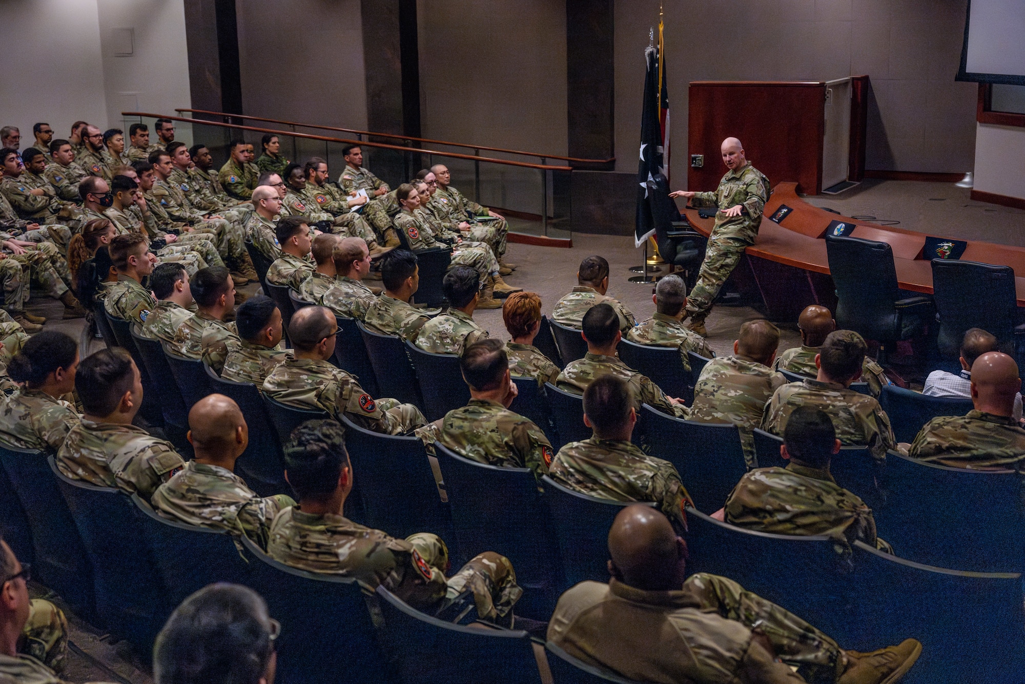 Military leaders speaks to members of his staff