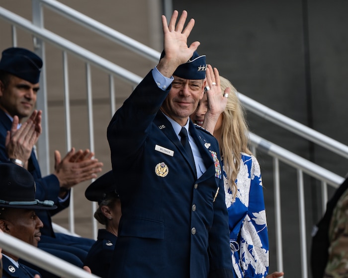 U.S. Air Force Chief of Staff Gen. Ken Wilsbach waves to attendees during a Basic Military Training graduation ceremony at Joint Base San Antonio-Lackland, Texas, April 23, 2026. Wilsbach presided over the ceremony after engaging with military training instructors and the service’s newest Airmen throughout a multi-day visit.