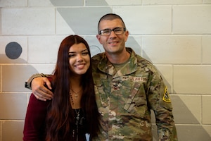 2 people smiles for a photo