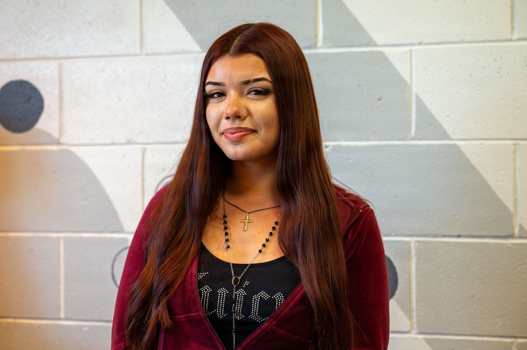 a person smiles for a photo