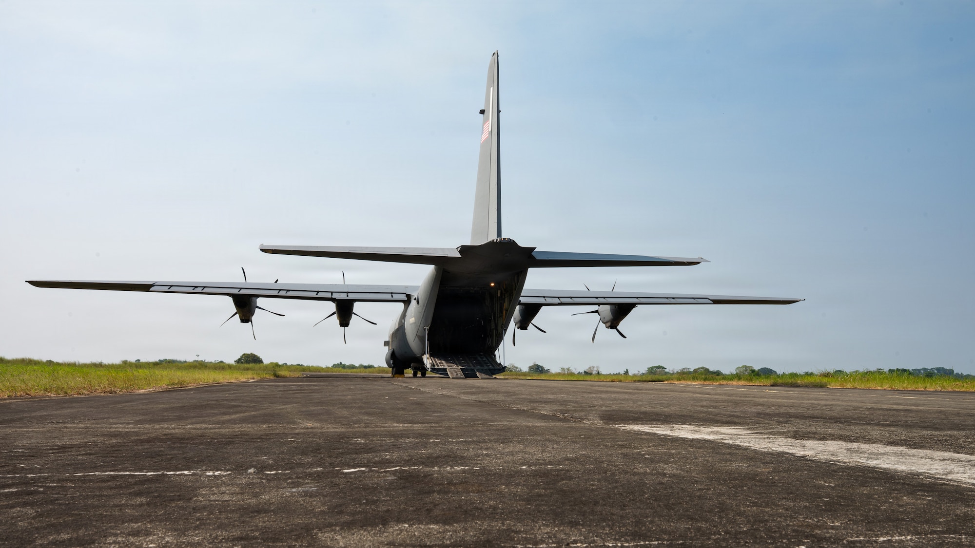 Airmen fly in a C-130J