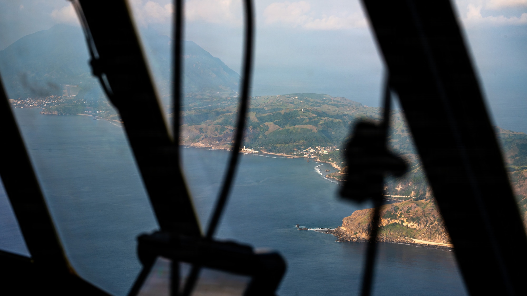 Airmen fly in a C-130J