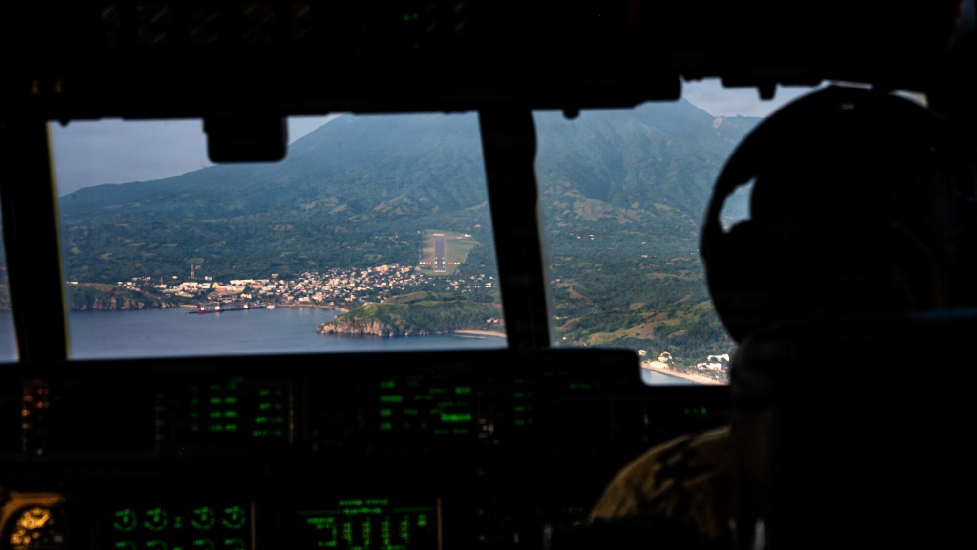 Airmen fly in a C-130J