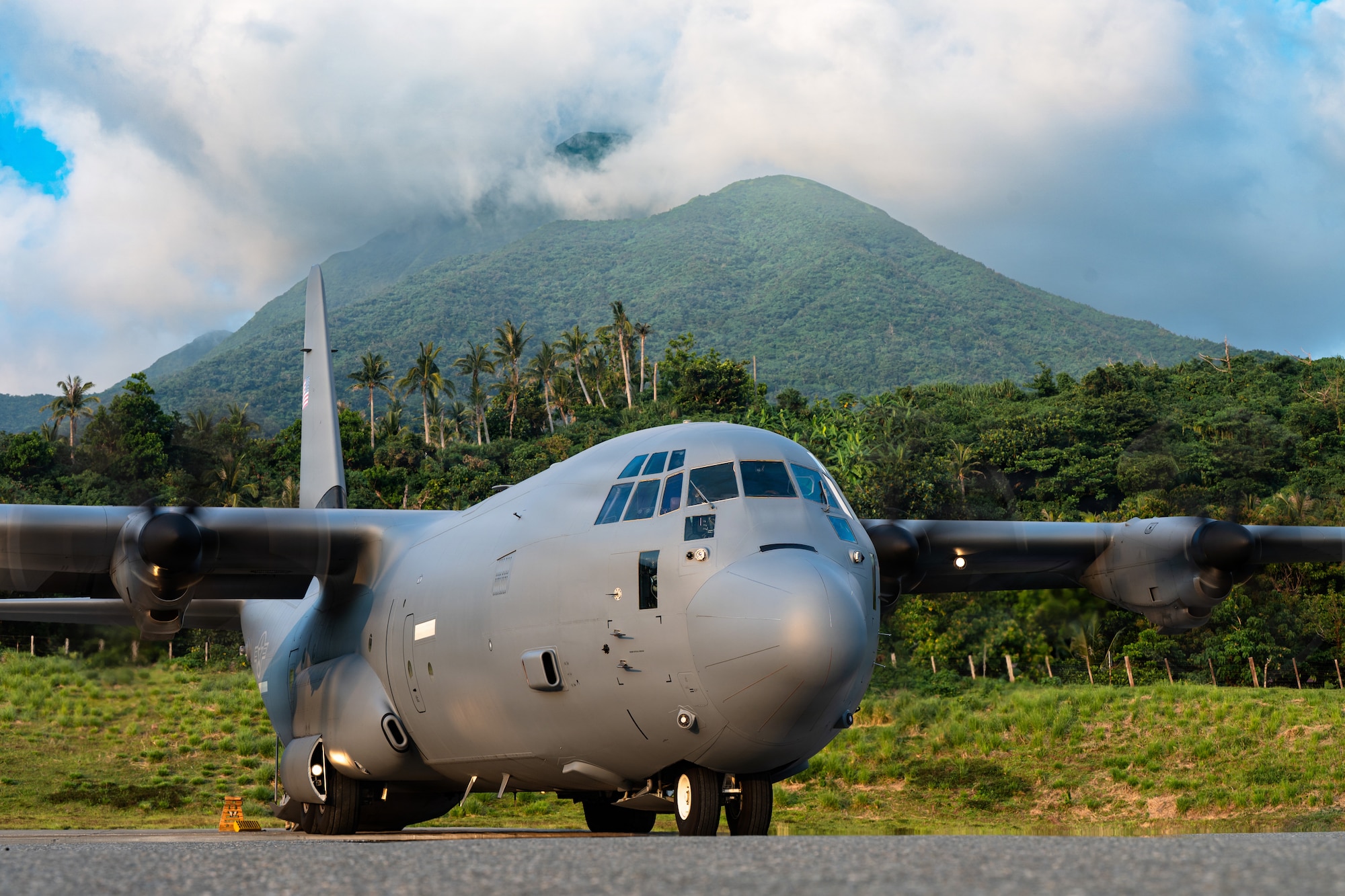 Airmen fly in a C-130J