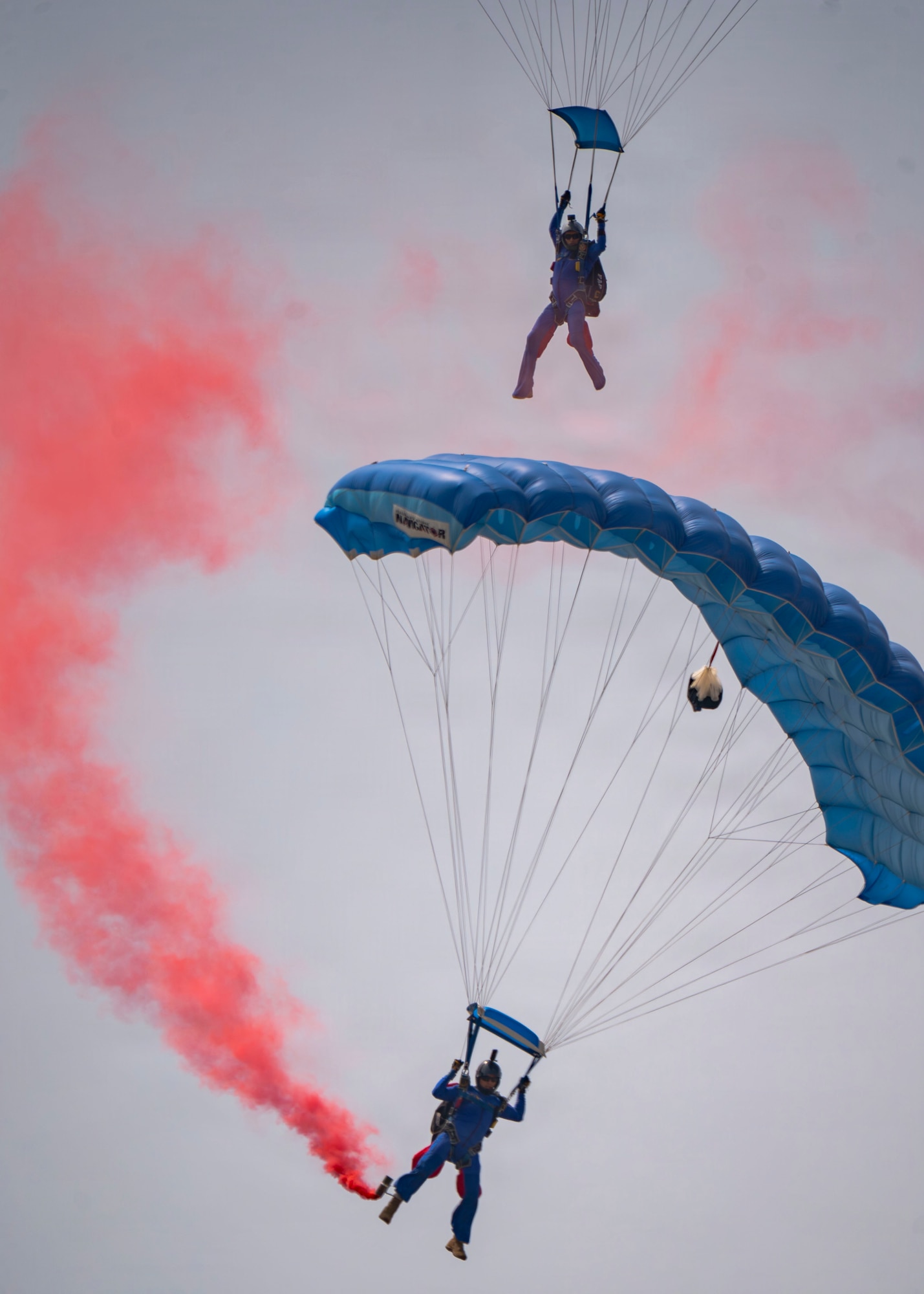 Members of the Escuadrilla de Paracaidismo de la FAP perform during the Peru Airshow at Las Palmas Air Base, Peru, April 25, 2026. The team represents the Peruvian Air Force through precision parachute demonstrations, showcasing skill and professionalism to a national and international audience. (U.S. Air Force photo by Staff Sgt. Lauren Diaz)
