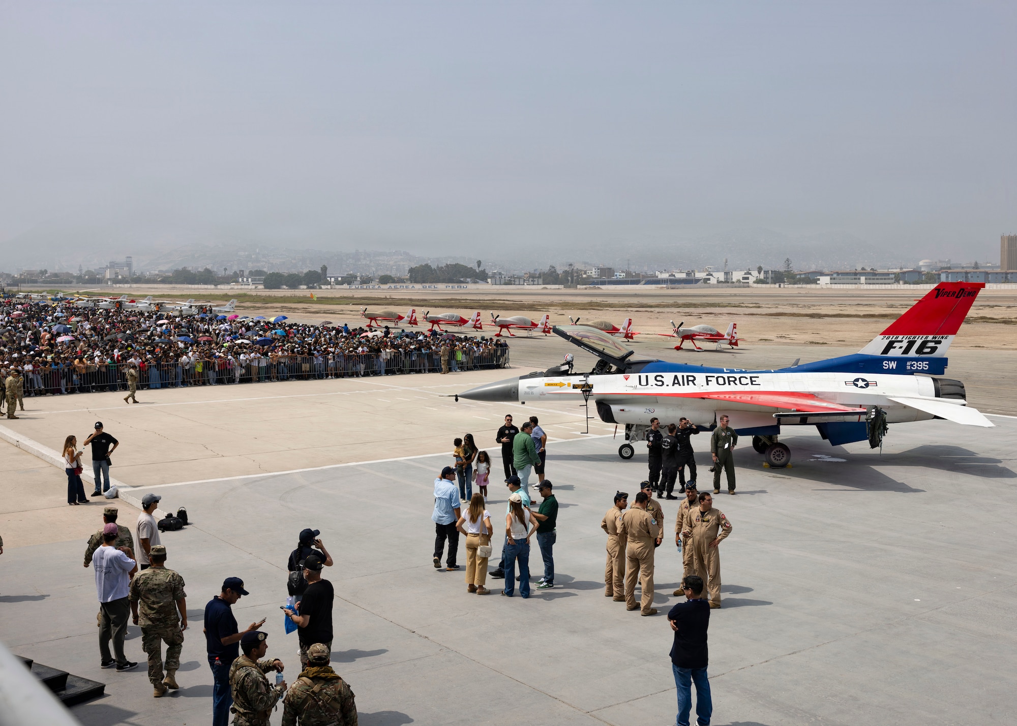 Crowds gather to watch the F-16 Viper Demonstration Team at Las Palmas Air Base, Peru, April 25, 2026, during the Peru Airshow. The Peru Airshow features a variety of aerial performances and aircraft displays for an international audience, demonstrating a wide range of aviation capabilities and platforms. (U.S. Air Force photo by Staff Sgt. Lauren Diaz