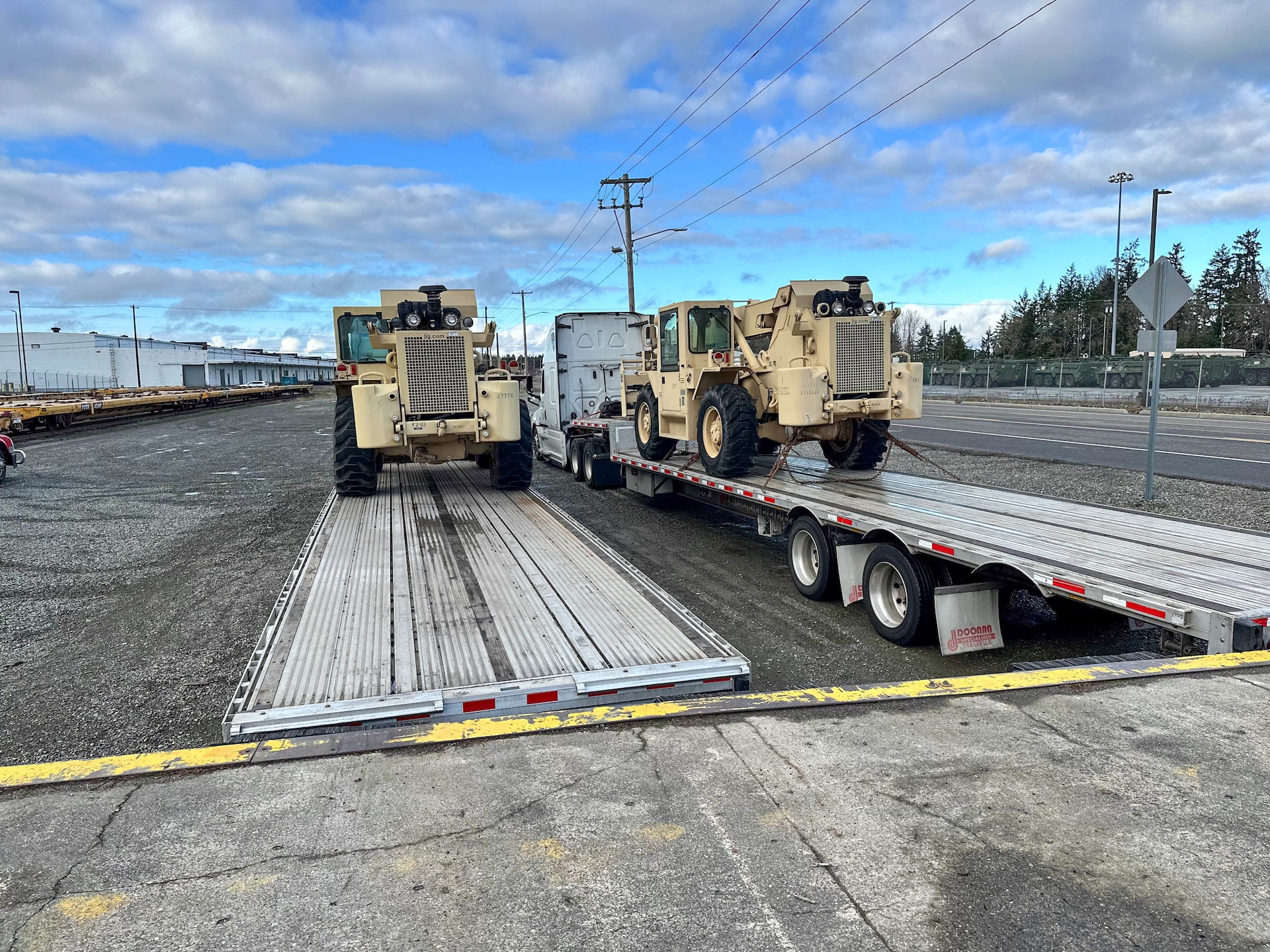 U.S Army Reserve forklifts assigned to 477th Inland Cargo Transportation Company, 385th Transportation Terminal Battalion, 364th Expeditionary Sustainment Command, arrives at Joint Base Lewis-McChord, Washington, for tips and scales prior to forward positioning in the Indo-Pacific region, Jan. 12, 2026. The 364th Expeditionary Sustainment Command is headquartered in Marysville, Washington, and is regionally aligned to U.S. Indo-Pacific Command, providing logistical and sustainment support across seven western states and the Indo-Pacific region. (Courtesy Photo)