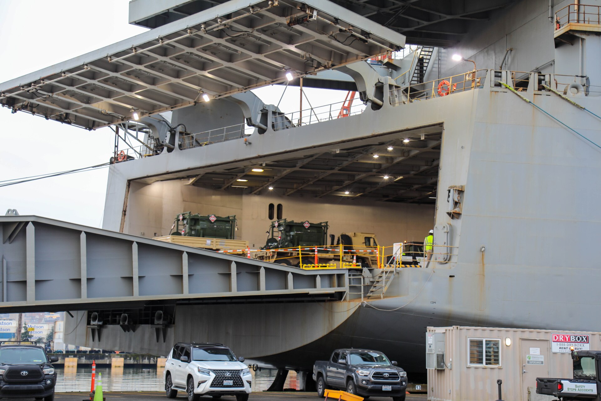A U.S. Army Reserve M1083 Medium Tactical Vehicle with trailer carrying fuel tanks, assigned to the 477th Inland Cargo Transportation Company, 385th Transportation Terminal Battalion, 364th Expeditionary Sustainment Command, is driven aboard the MV Cape Horn (T-AKR-5068) at the Port of Tacoma, Washington, as part of forward positioning efforts in the Indo-Pacific region, Feb. 4, 2026. The 364th Expeditionary Sustainment Command is headquartered in Marysville, Washington, and is regionally aligned to U.S. Indo-Pacific Command, providing logistical and sustainment support across seven western states and the Indo-Pacific region. (U.S. Army Photo by Maj. India Hunter)