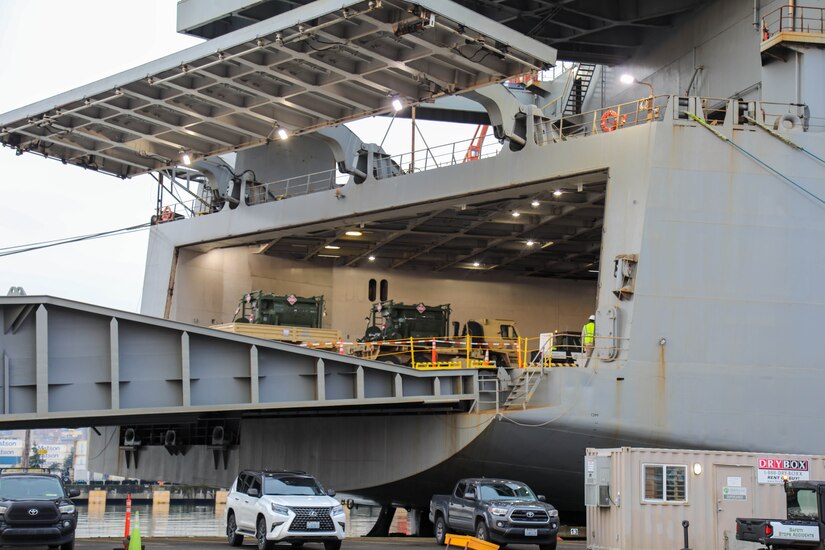 A U.S. Army Reserve M1083 Medium Tactical Vehicle with trailer carrying fuel tanks, assigned to the 477th Inland Cargo Transportation Company, 385th Transportation Terminal Battalion, 364th Expeditionary Sustainment Command, is driven aboard the MV Cape Horn (T-AKR-5068) at the Port of Tacoma, Washington, as part of forward positioning efforts in the Indo-Pacific region, Feb. 4, 2026. The 364th Expeditionary Sustainment Command is headquartered in Marysville, Washington, and is regionally aligned to U.S. Indo-Pacific Command, providing logistical and sustainment support across seven western states and the Indo-Pacific region. (U.S. Army Photo by Maj. India Hunter)