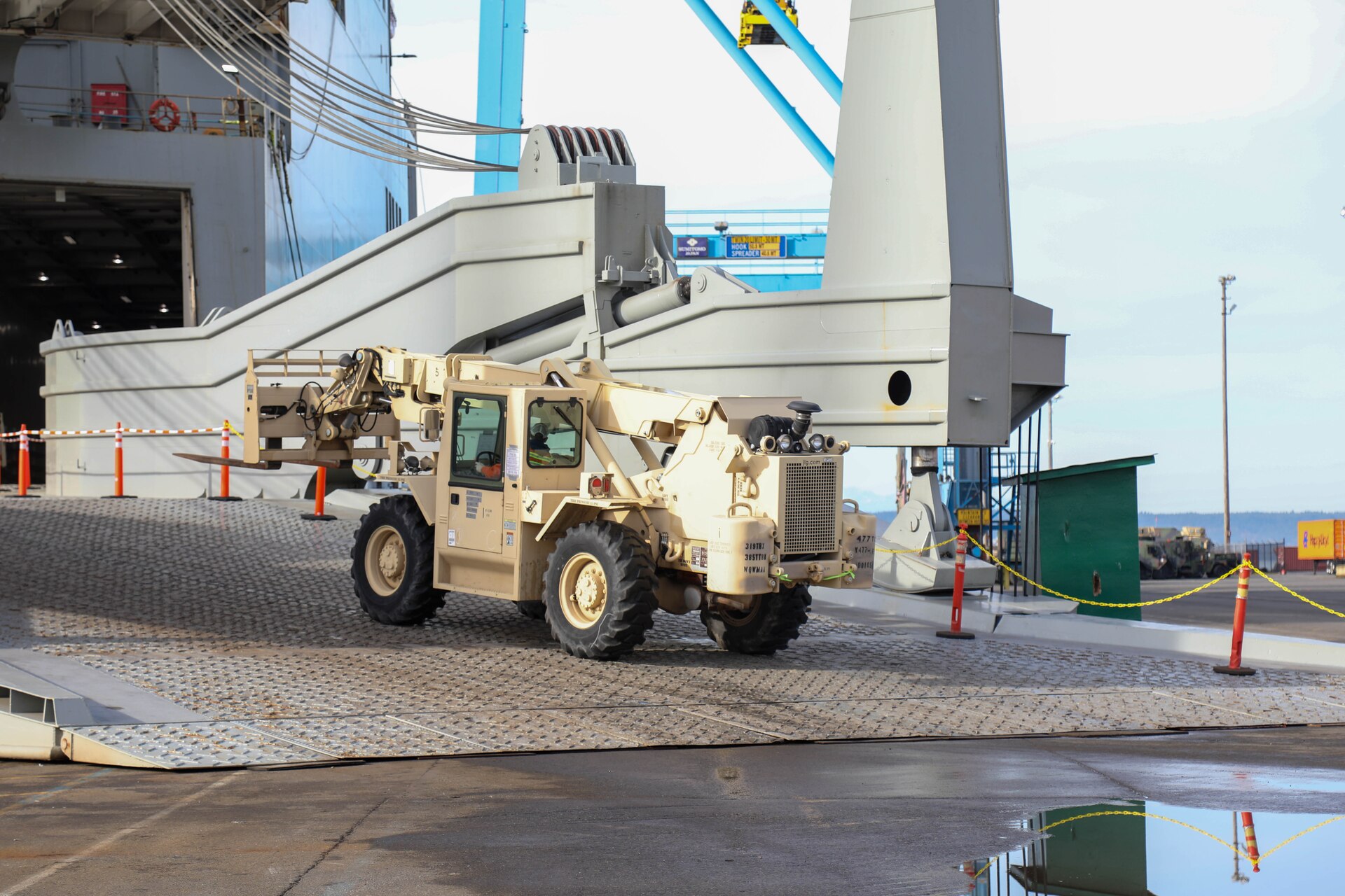A U.S. Army Reserve forklift assigned to the 477th Inland Cargo Transportation Company, 385th Transportation Terminal Battalion, 364th Expeditionary Sustainment Command, is driven aboard the MV Cape Horn (T-AKR-5068) at the Port of Tacoma, Washington, as part of forward positioning efforts in the Indo-Pacific region, Feb. 4, 2026. The 364th Expeditionary Sustainment Command is headquartered in Marysville, Washington, and is regionally aligned to U.S. Indo-Pacific Command, providing logistical and sustainment support across seven western states and the Indo-Pacific region. (U.S. Army Photo by Maj. India Hunter)