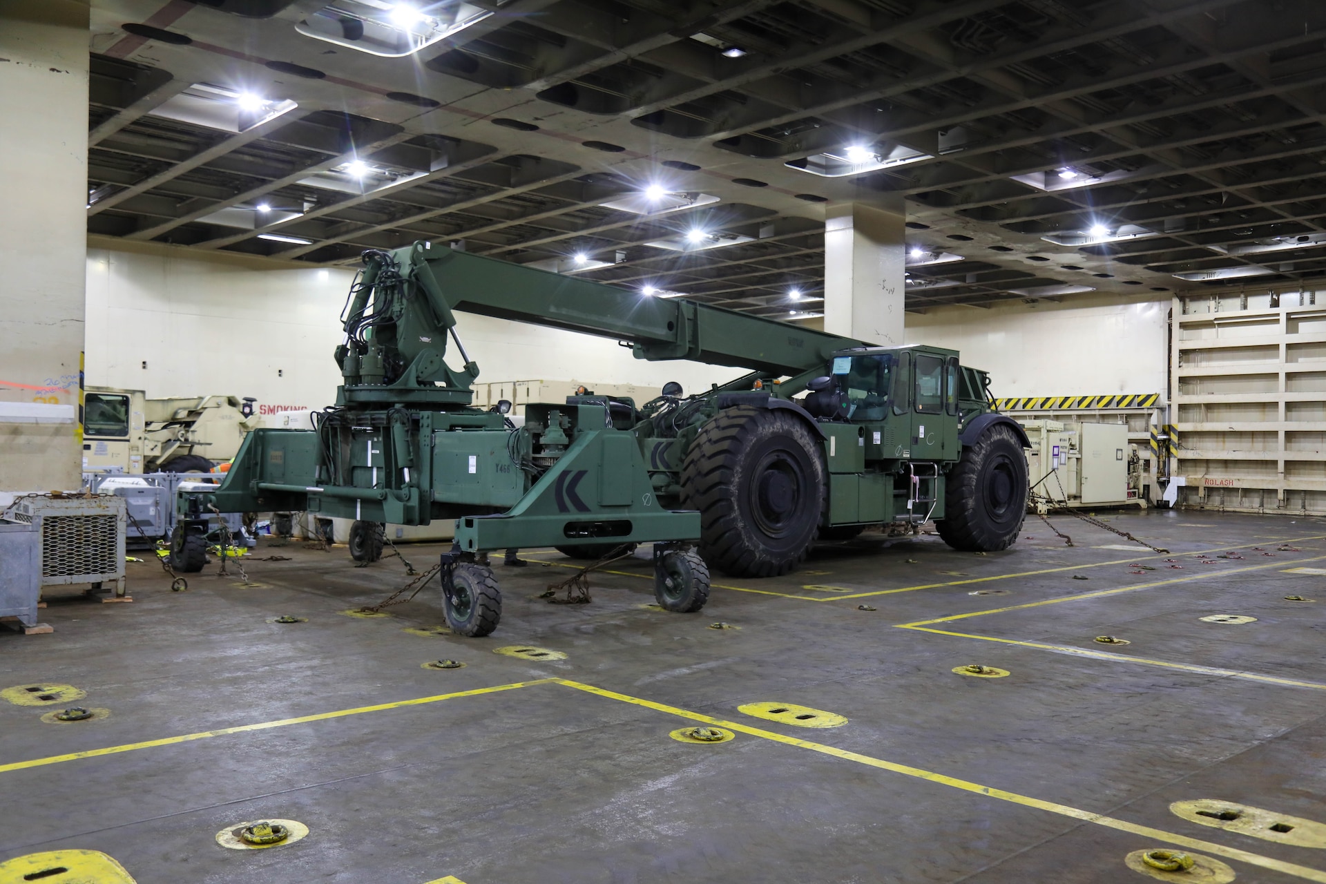 A U.S. Army Reserve Kalmar TRA240 Rough Terrain Container Handler assigned to the 477th Inland Cargo Transportation Company, 385th Transportation Battalion, 364th Expeditionary Sustainment Command, is secured in the cargo deck aboard the MV Cape Horn (T-AKR-5068) at the Port of Tacoma, Washington, as part of forward positioning efforts in the Indo-Pacific region, Feb. 04, 2026. The 364th Expeditionary Sustainment Command is headquartered in Marysville, Washington, and is regionally aligned to U.S. Indo-Pacific Command, providing logistical and sustainment support across seven western states and the Indo-Pacific region. (U.S. Army Photo by Maj. India Hunter)
